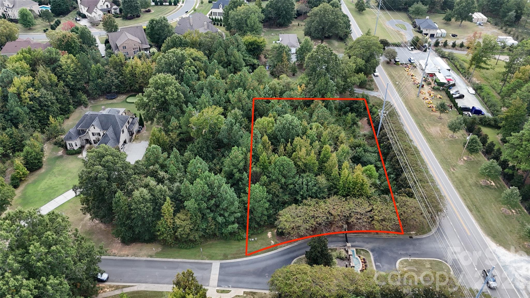 Exceptional homesite located in the prestigious gated community of Victoria Lake, just off Providence Road in highly sought-after Union County. This beautiful lot offers the perfect combination of privacy, natural surroundings, and luxury living, all while benefiting from low Union County taxes and top-rated Weddington schools.
Ideally situated near shopping, dining, and major interstate access, this property provides everyday convenience while maintaining a peaceful residential setting. A major advantage for the future homeowner—water and sewer connection fees have already been paid by the seller, creating significant savings.
This homesite is ready for a custom luxury residence, with architectural plans already available featuring a thoughtfully designed layout, spacious living areas, and a seamless indoor-outdoor concept. Plans include a resort-style pool and detached pool house, creating the ultimate entertaining space and private retreat.
Minimum build starts at 3,000 square feet, with the ability to expand well beyond, making this a rare opportunity to build your dream home in one of the area’s most desirable gated communities. Don’t miss your chance to create something truly special in Victoria Lake.