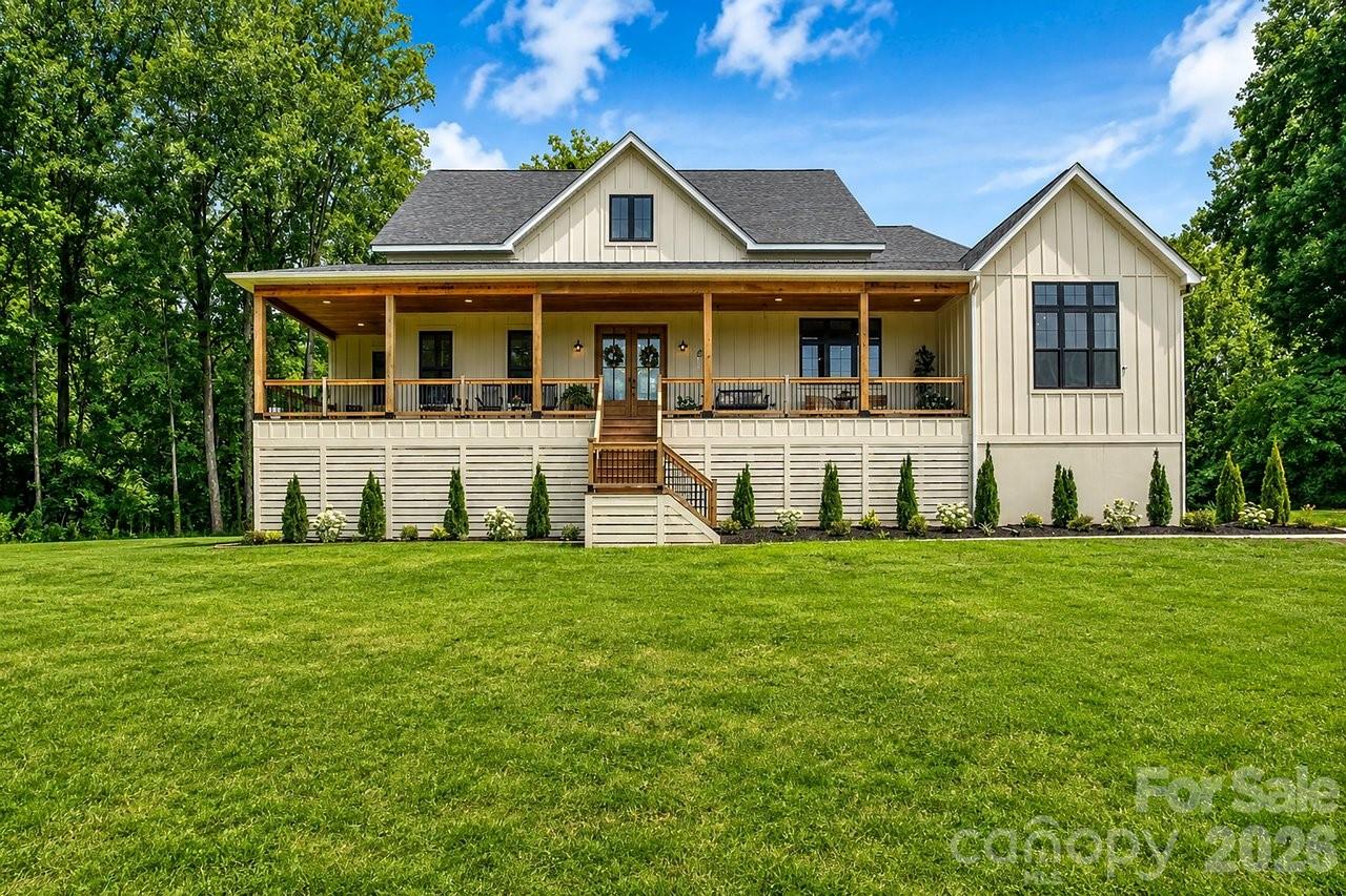 Welcome to your own private retreat on approximately 10 acres in desirable eastern Cabarrus County. Built in 2024, this custom home offers the perfect blend of luxury, privacy, and endless possibilities.

Inside, you'll find an open-concept floor plan featuring a spacious great room, gourmet kitchen, large dining area, split-bedroom layout, and a luxurious primary suite with spa-inspired bath and oversized walk-in closet. Upstairs, the bonus room with full bath provides flexible space for guests, a home office, media room, or additional living area.

Expansive covered porches overlook peaceful wooded surroundings, creating the perfect setting for entertaining or relaxing while enjoying the beauty and privacy of country living.

The unfinished basement offers incredible potential for a game room, gym, workshop.

Conveniently located near Downtown Concord, Mount Pleasant, shopping, dining, parks, and Charlotte, this property delivers the rare combination of modern construction, acreage, and privacy without sacrificing convenience.

Conceptual renderings have been provided to inspire buyers and showcase future possibilities. Pool, outdoor living areas, and basement improvements shown are artist renderings only. Buyers should verify permits, approvals, and feasibility for future projects.

A rare opportunity to own a custom-built retreat with room to dream, grow, and create the lifestyle you've always imagined.

Two photos included in the listing are AI-generated conceptual renderings intended to help buyers visualize future possibilities. These images depict potential outdoor living spaces and basement uses and are not representations of existing improvements.

Private 10-acre setting with endless possibilities. Buyer and buyer's agent should verify schools, permits, flood insurance requirements, and all information deemed important.