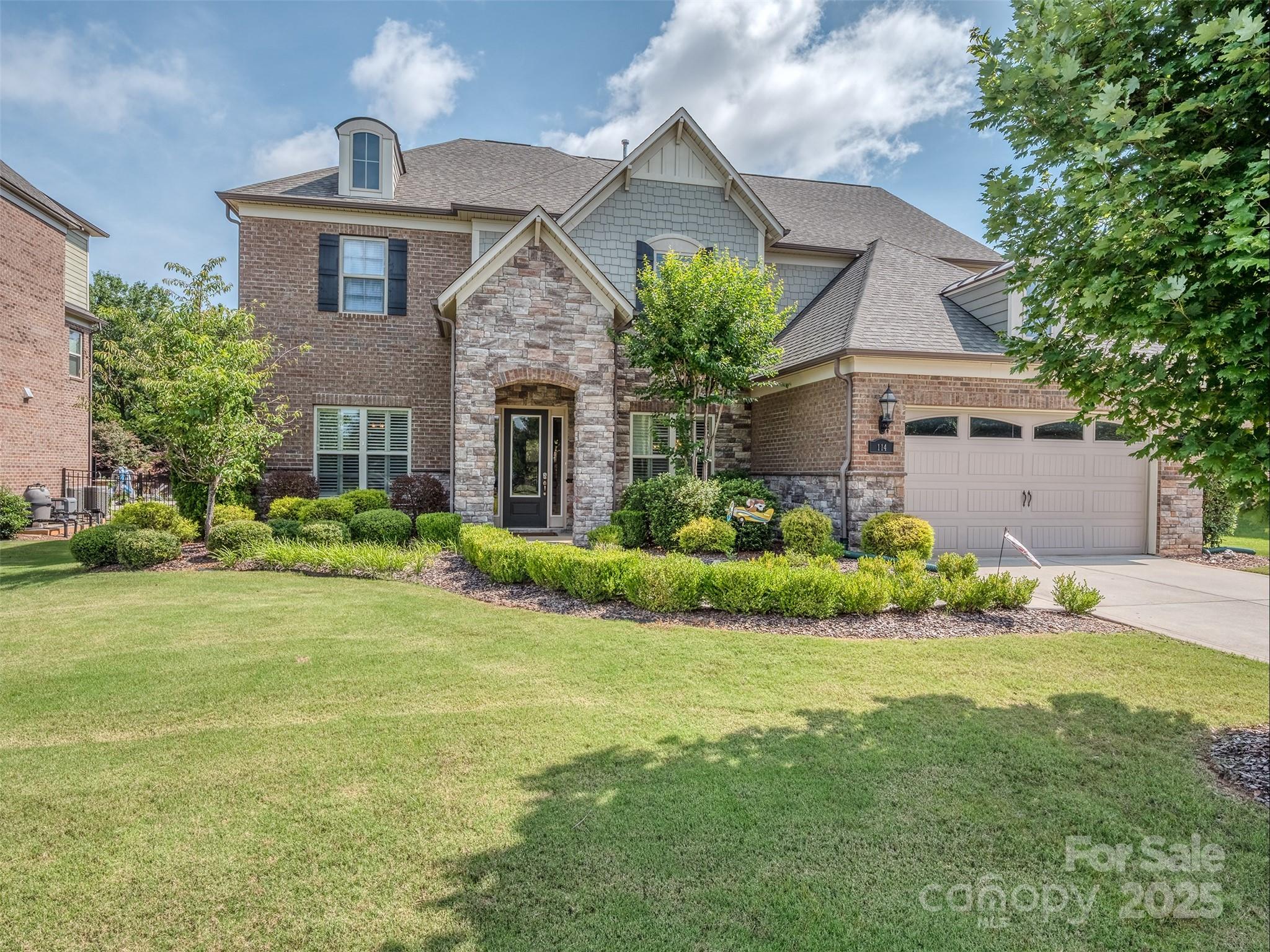 This former Model Home by Pulte is loaded with features & is ready for you to call it home!  Estates at Audubon Lake is a premiere South Charlotte community with Low South Carolina Taxes, great community amenities, award winning Lancaster Schools, & close proximity to Ballantyne, Fort Mill, Charlotte, & More! This home features main floor study, formal dining room, extensive hardwood floors, huge great room, coffered ceiling, gourmet kitchen with huge granite island, custom cabs, gas range, tile backsplash, huge walk-in pantry, & Sonos with Speakers. Guest suite & office on the main floor. The primary suite is on the 2nd floor, has tons of natural light, trey ceiling, & huge primary bath featuring a corner shower with rainfall head, huge soaking tub, tile, dual granite vanities, & oversized closet. The 4 2nd floor guest rooms are spacious & there are 2 additional full baths. The 3rd floor bonus has a 1/2 bath & has limitless possibilities! Covered rear patio & fenced yard are a bonus!