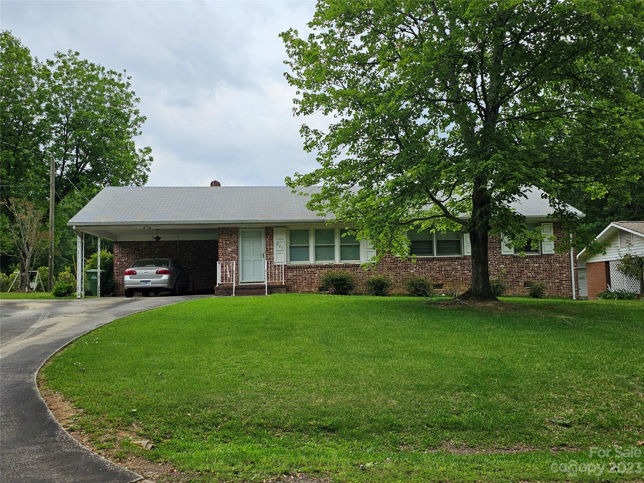 Come and enjoy this 3 bedroom home with it's large great room/sunroom that features cathedral ceiling and can lighting. Kitchen has been updated and features stainless steel appliances and silestone counter tops. Bedrooms have beautiful hardwood floors. There's a concrete patio to enjoy the outdoors and also for grilling.  Large storage building outside.