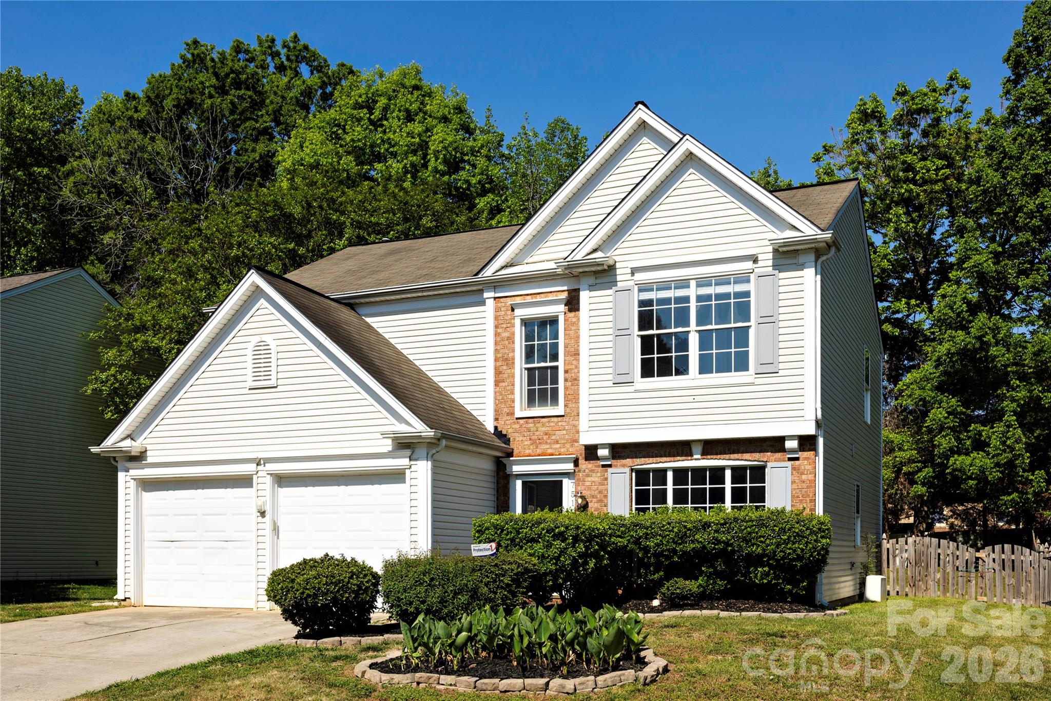 Nicely updated home in quiet community located in University area within 1/4 mile to shopping, restaurants, I85 and other conveniences. Freshly painted throughout with a beautiful formal room located off 2 story foyer. Kitchen features stainless steel appliances, granite countertops and a pretty nice sized island for cooking and/or breakfast.  Nice dining area in kitchen featuring sliding doors to patio leading to a huge backyard with fencing. Kitchen opens to cozy family room with gas fireplace. Beautiful crown molding and LTV flooring throughout entire downstairs. Carpeted stairway leads to huge primary suite and 3 secondary bedrooms, all carpeted. Primary bathroom boasts two sinks and garden tub/shower combo. There’s also a large adjoining closet. All bathrooms have LTV flooring and new commodes. The washer and dryer is conveniently located upstairs as well. Don’t miss the balcony overlooking foyer. Home has new lighting fixtures/ceiling fans  throughout, electrical panels and smoke/CO detectors.