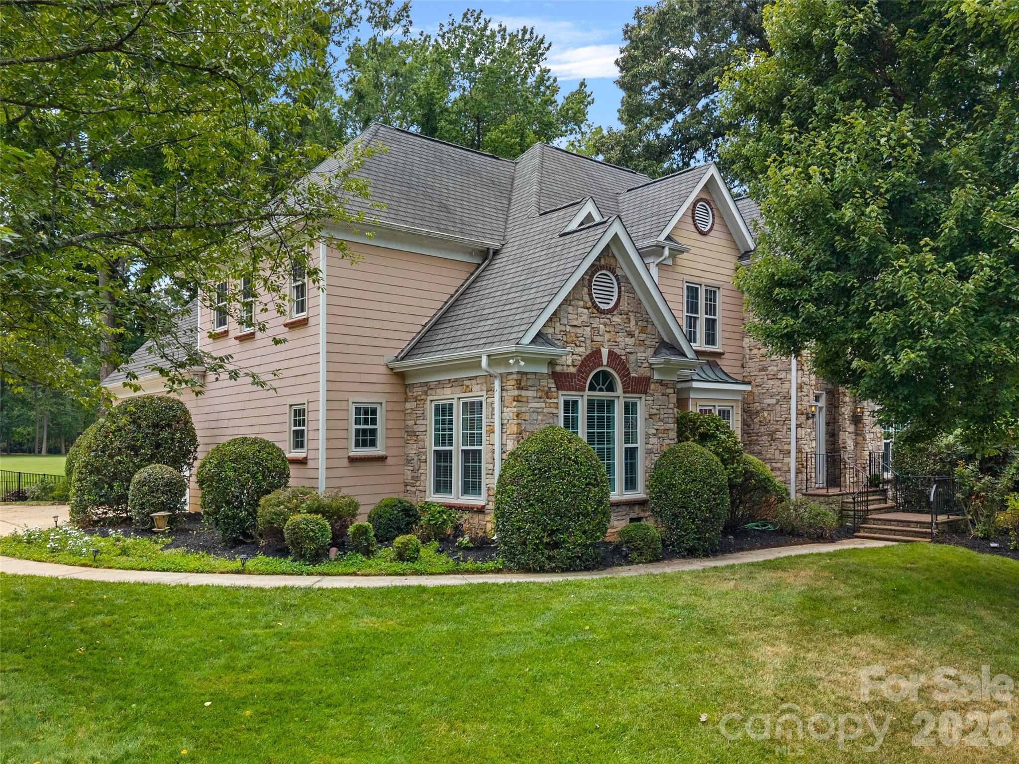 Beautiful stone and shingle home in popular River Run neighborhood. The large great room, with fireplace, and vaulted ceiling, opens to the dining area which provides a great space for entertaining family and friends. A butler's pantry is conveniently located between the Dining Room and Kitchen. The light filled Kitchen has abundant counter space, an island, bar, breakfast area, & large walk-in Pantry. A Laundry room with sink is conveniently located on the first floor. 
The spacious first floor Primary bedroom, Ensuite Primary Bath, and Large Walk-in closet provide a great place to relax. Completing the first floor is a light filled Office, and 1/2 bath. 
The well planned second floor has 3 large bedrooms, 2 with walk-in closets, 2 full baths, and Bonus room which provides additional entertainment space. For storage needs there a several walk-in attic spaces along with access to additional attic space via pull down stairs. 
The garage has a separate storage room for lawn or recreation items.
For outside enjoyment there is a deck and patio area with a great view of the 10th fairway of the River Run Golf course.