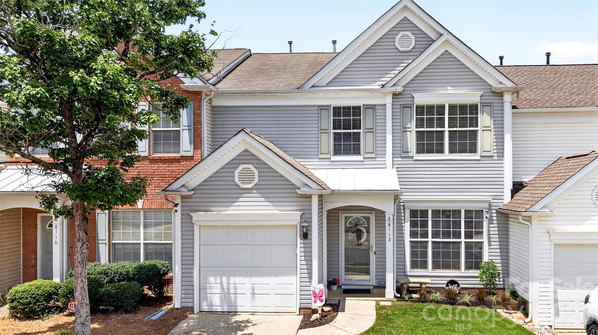 WELCOME HOME to this beautifully updated, move-in ready townhome in the heart of South Charlotte! Nearly every surface has been refreshed, including fresh paint throughout the entire home in June 2026, covering walls, ceilings, trim, doors, closets, and even the garage. New carpet and luxury vinyl flooring upstairs add a modern, fresh feel from the moment you walk in.

The main level features a spacious foyer, formal dining room, and an open-concept kitchen overlooking the great room and breakfast area. The cozy gas fireplace creates a warm focal point, while stainless steel appliances and abundant cabinet space make the kitchen both functional and inviting. A convenient powder room completes the first floor.

Step outside to enjoy your private backyard retreat featuring a low-maintenance Trex deck and a brand-new expanded concrete patio completed in June 2026, creating the perfect space for entertaining, grilling, or relaxing outdoors. A large patio umbrella is included for added comfort and enjoyment.

Upstairs, the spacious primary suite boasts a vaulted ceiling, dual vanity, garden tub, separate shower, and a large walk-in closet. Two generously sized secondary bedrooms offer excellent closet space and flexibility for guests, family members, or a home office.

The sellers have invested significantly in recent updates, including a new 50-gallon gas water heater (2024), new LG top-load washer and dryer (2026), new attic stairs (2026), new garbage disposal (2026), and new carbon monoxide and smoke detectors (2026). Additional mechanical updates include a furnace replaced in 2018 and AC unit replaced in 2015.

Residents enjoy access to outstanding community amenities including a clubhouse, swimming pool, playground, and tennis courts. Located within highly rated South Charlotte schools and just minutes from shopping, dining, and entertainment at Blakeney, StoneCrest, Ballantyne, and Waverly, this home offers the perfect combination of convenience, comfort, and value.

With extensive recent improvements already completed, all that's left to do is move in and enjoy!