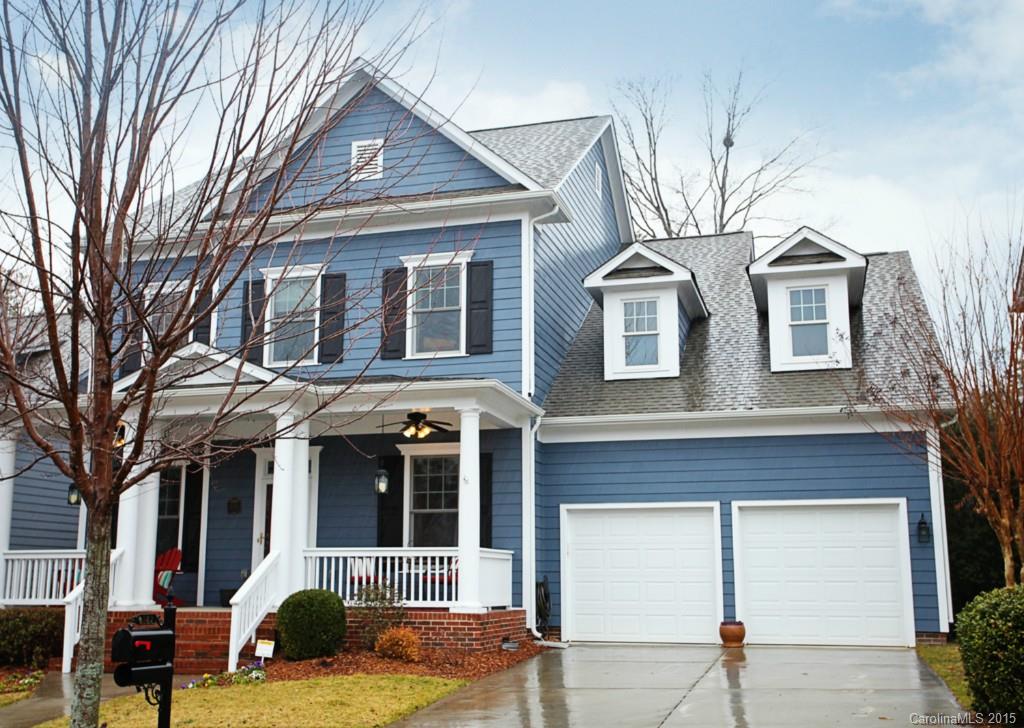Picture perfect Baxter home with Covered Deck and Patio offering a Wooded View! Southern Front Porch. Hardwoods flow through the wonderful open floor plan. GOURMET Kitchen w/gas cooktop, wall oven, granite, SS, tile back splash, bkfst bar & bkfst area. Luxurious Master Suite with sitting area, custom closet & jetted tub. Wired for surround in Great Room & Bonus. Loft area or 2nd bonus. Fenced yard w/irrigation  Tandem garage has space for three cars. MUST SEE!