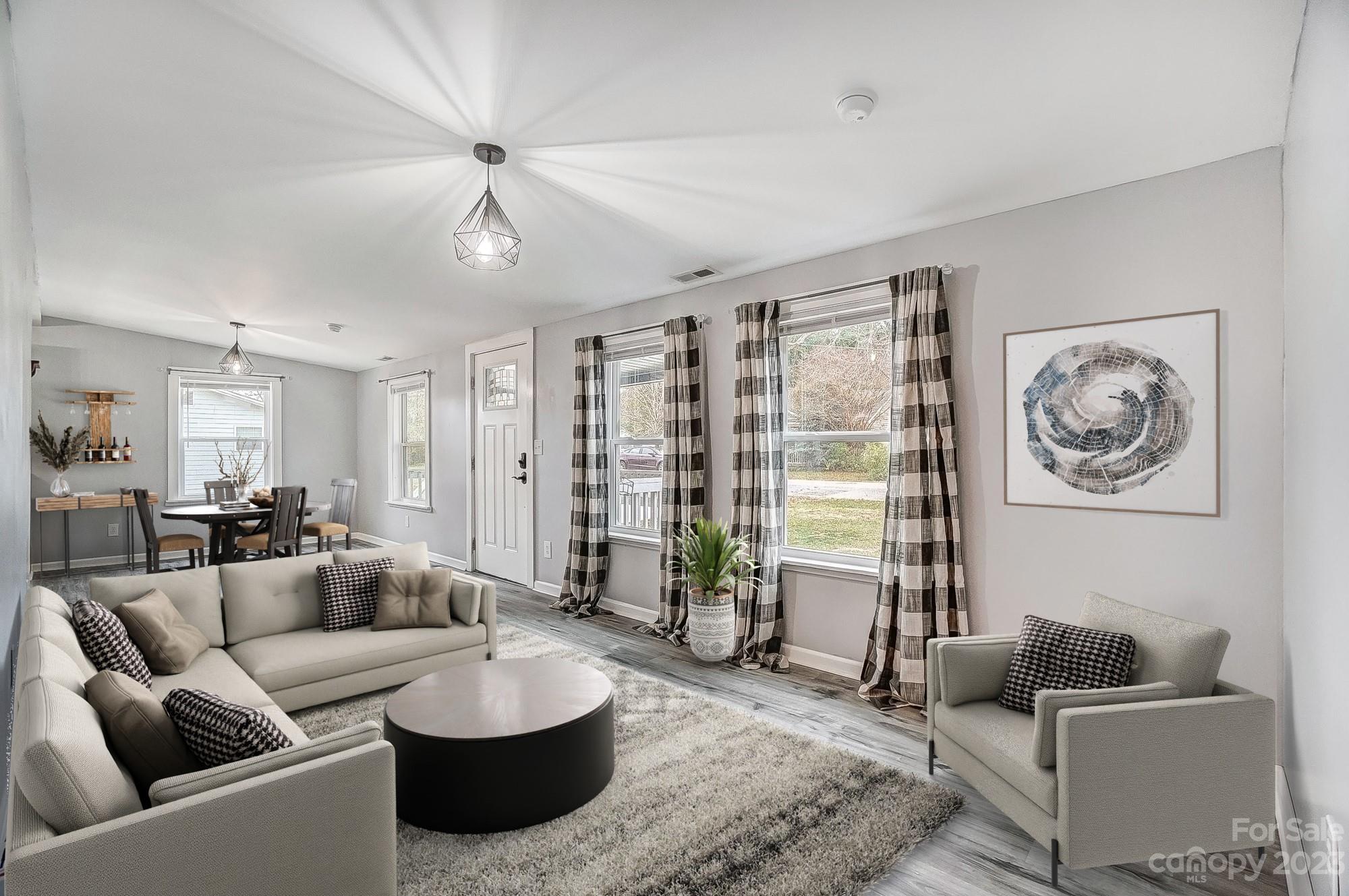 Imagine finding a rare turn-key, beautifully renovated home under $250,000.  Well, you have found it! This sought-after single family home is a three-bedroom, two-bath residence which offers 1,070 square feet of well-designed living on a good-sized lot. Inside, the home is fully renovated with waterfall butcher block countertops, impressive new flooring in 2021, a spacious floor plan and impressive new light fixtures to illuminate it all. Outside, a reinforced concrete driveway has been added with a 30-amp electrical outlet that’s ready for a recreational vehicle. The enhancements continue with a new roof in 2020, a rebuilt and upgraded engineered septic system in 2021 and a new vapor barrier in the crawl space. The barn and pergola come with the house, which has no HOA to deal with. The county has verified there is no permit on file because of the home’s age. It’s ready for your viewing.