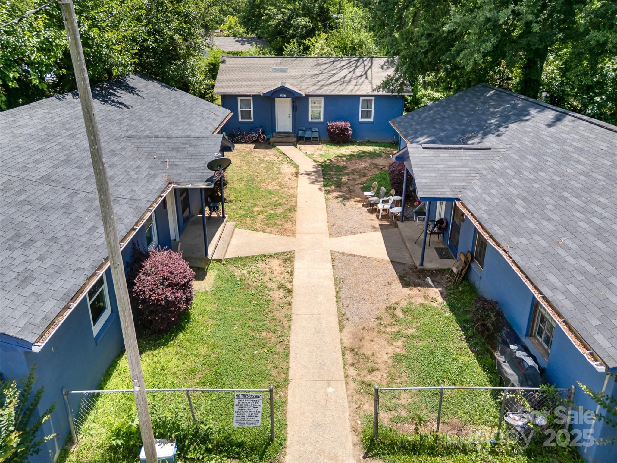 Located just minutes from downtown Rock Hill, this fully leased multifamily property offers investors an exceptional blend of immediate income and long-term growth potential! The asset consists of two 2-BR, 1-BA duplexes and one 3-BR, 1-BA SFH, providing diversified rental income with stable, long-term tenants. Recent upgrades include new roofs on all buildings, recently replaced HVAC systems, & modern cosmetic improvements, ensuring low maintenance costs and hassle-free ownership. The property features ample parking and generous yard space, adding appeal for tenants. With a 9% cap rate, 11% cash-on-cash return, and an NOI of $53,400, this turnkey investment delivers strong, reliable returns. Rents are already performing well, with additional upside potential in a fast-growing market like Rock Hill. Whether you're looking for passive income or a hold-and-appreciate asset, this property checks all the boxes. Don’t miss this rare chance to own a high-yielding, low-maintenance investment!