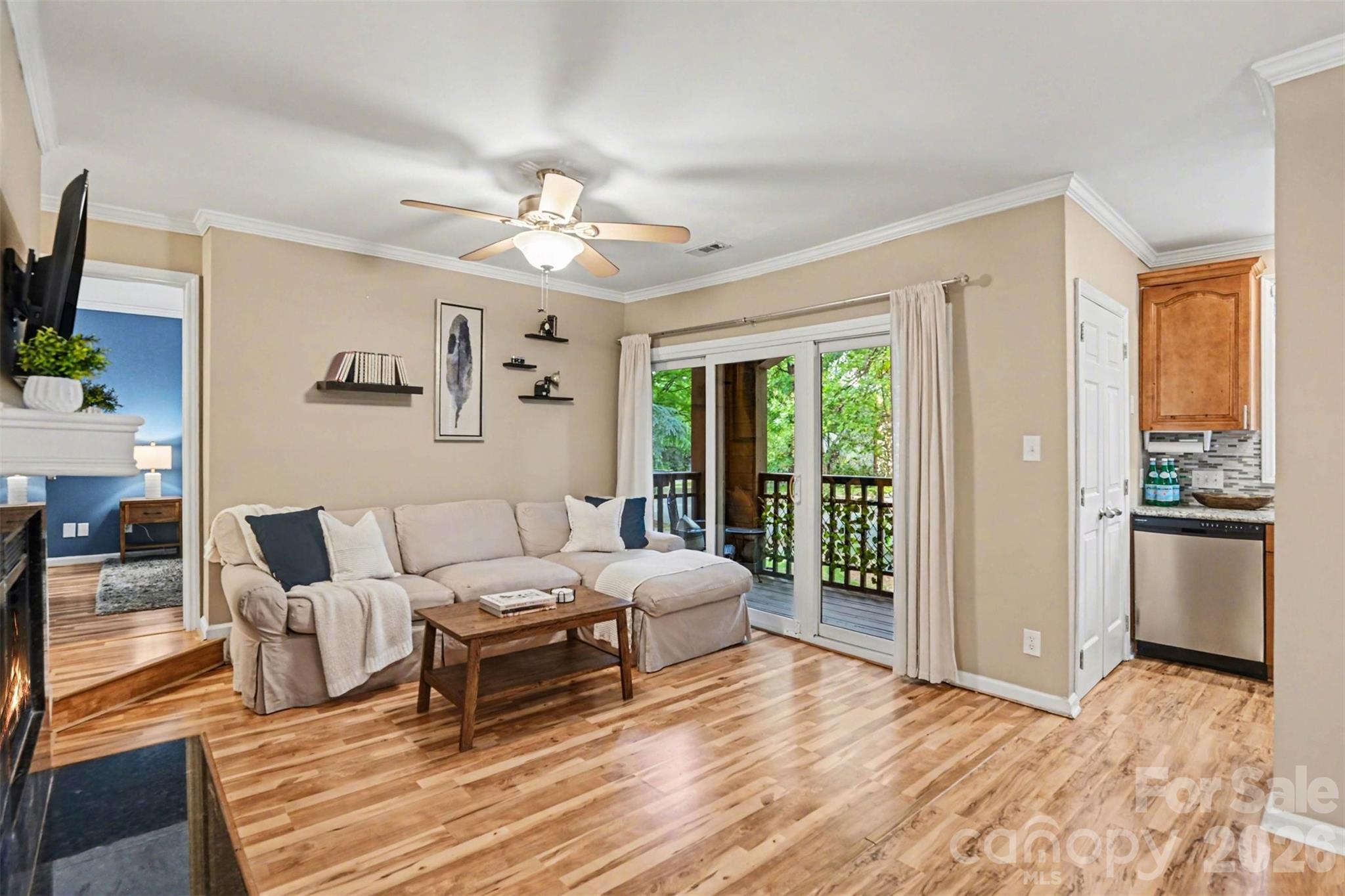 Perfectly positioned in the heart of Dilworth, this beautifully maintained 2-bedroom, 1.5-bath condo offers the ideal combination of charm, convenience, and low-maintenance living. Located in the sought-after Latta Square community, residents enjoy easy access to the Little Sugar Creek Greenway, popular restaurants, boutique shopping, coffee shops, nightlife, and all the energy of nearby South End and Uptown Charlotte.

Step inside to find a bright and inviting interior with an easy-flow floor plan designed for comfortable everyday living. The welcoming living area is anchored by a cozy fireplace and offers direct access to a private covered balcony—perfect for relaxing outdoors or enjoying peaceful neighborhood views. The kitchen features granite countertops, abundant cabinetry, and functional prep space ideal for both cooking and entertaining.

Upstairs, the spacious primary bedroom includes a private ensuite bath and ample closet storage, while the secondary bedroom provides excellent versatility for guests, a roommate setup, or a dedicated work-from-home space.

Latta Square residents enjoy community amenities including a pool, plus HOA coverage for water, trash service, lawn care, exterior maintenance, and more. Whether you're searching for a primary residence, investment opportunity, or a lock-and-leave lifestyle in one of Charlotte’s most desirable neighborhoods, this Dilworth condo is a rare opportunity to enjoy urban living with neighborhood charm.