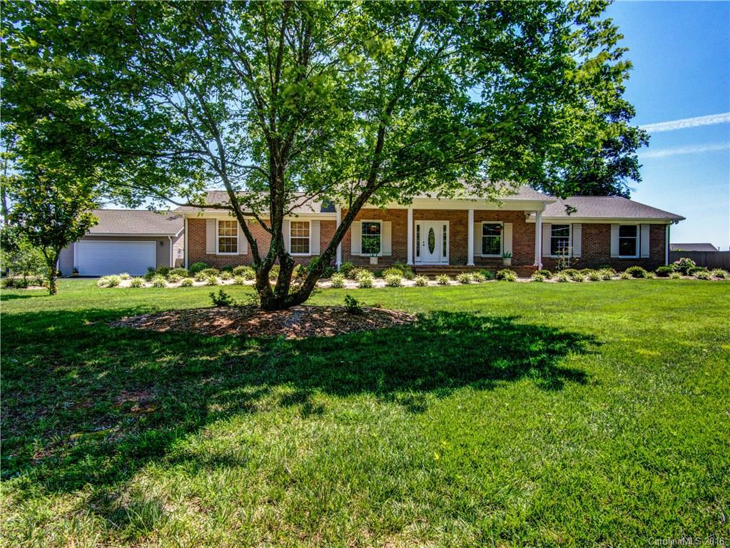 BEAUTIFUL home in South Charlotte! Home completely upgraded w hardwoods throughout, open kitchen w large island, SS appliances, granite counters; spacious great room w fireplace; large master suite w en suite retreat. Mud Room can be used as office or added space for large pantry Walk out to large patio & backyard fenced for privacy Covered front porch! Great home for entertaining inside and out! No HOA! Completely finished climate controlled storage easily transitions to workshop/home business!