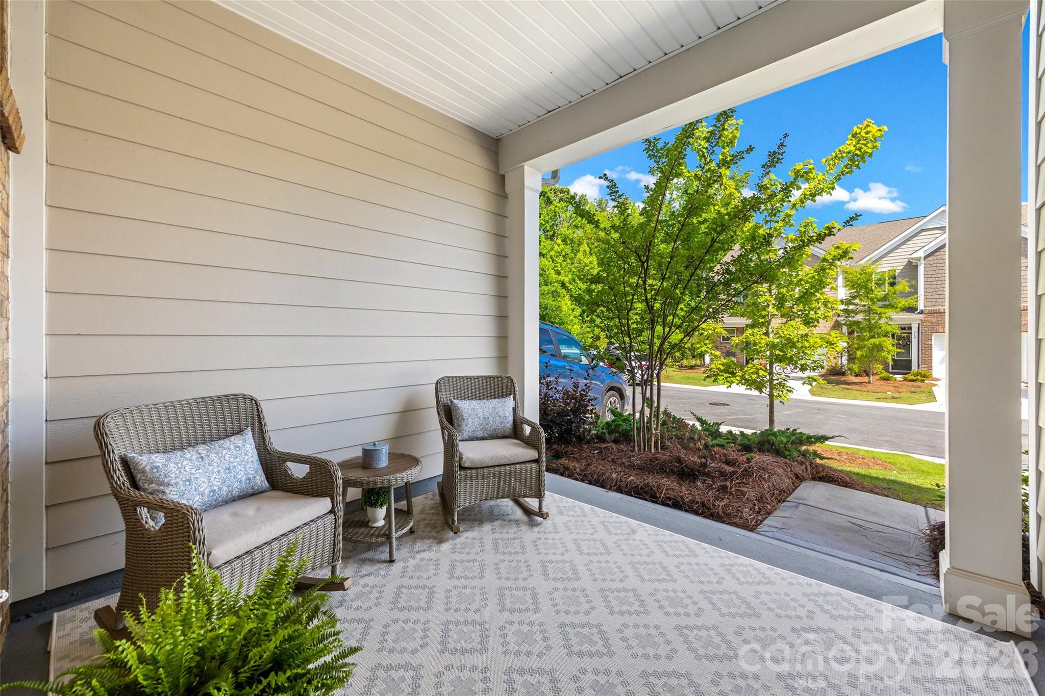 Some homes blend in. This one was designed to stand apart. Tucked along one of the quietest streets in the community, 711 Still Oak Trail offers a rare combination of privacy, convenience, and effortless everyday living in a market where many options feel repetitive. Thoughtfully reimagined to showcase how the home truly lives, the spaces extend well beyond the walls with inviting outdoor areas that function as additional living spaces, from the welcoming front porch to the screened porch designed for slow mornings, evening wind-downs, quiet conversations, and year-round enjoyment. Inside, the home balances comfort and functionality with an easy flow that feels both warm and manageable, ideal for buyers seeking low-maintenance living without sacrificing style or atmosphere. The staging intentionally highlights the lifestyle this home creates, not just the square footage on paper.
Located moments from shopping, dining, coffee, and everyday conveniences, the area continues to evolve with growing commercial investment and future development adding long-term appeal to an already desirable location. While many townhomes compete on price alone, this one offers something increasingly difficult to find: a quieter setting, livable outdoor space, and a lifestyle that simply feels better. The like new stainless steel fridge, as well as newer washer and dryer convey. Additional features include a Ring front door camera, MyQ smart garage door system, two garage door remotes, two pool access keys, and a smart front door lock ready for future setup.