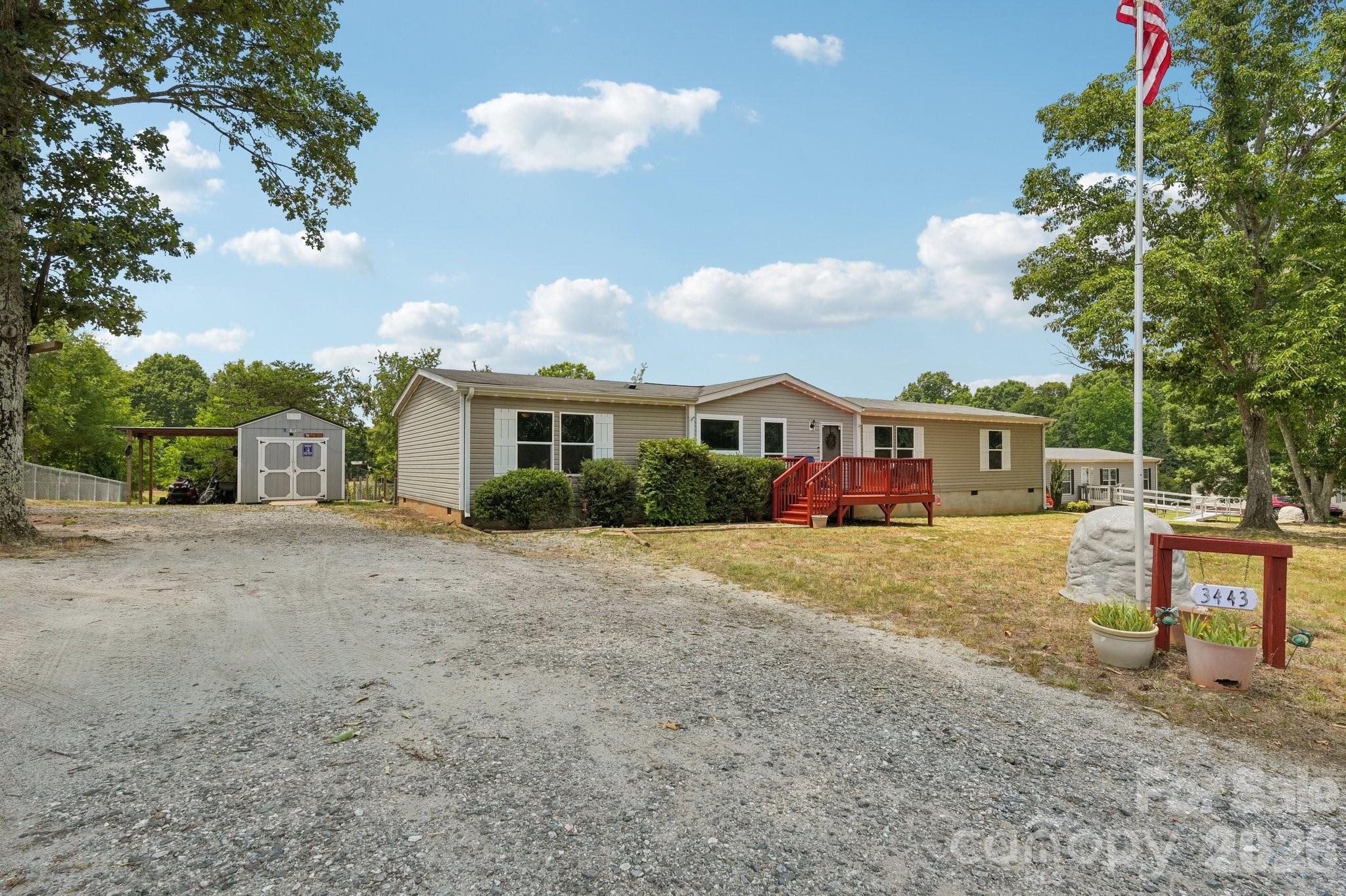 Welcome home to this spacious and well-maintained 3-bedroom home with a large bonus room that offers the flexibility of a fourth sleeping area, home office, playroom, or hobby space. Every bedroom features a walk-in closet, providing exceptional storage throughout the home.

The thoughtfully designed floor plan offers generous living spaces perfect for both everyday living and entertaining. The kitchen is equipped with a convenient motorized pop-up outlet built into the peninsula, making it easy to power small appliances while maintaining a clean, uncluttered look.

Step outside to enjoy the fenced backyard, ideal for pets, play, or relaxing evenings outdoors. A newer outbuilding provides additional storage, workshop space, or room for hobbies and equipment. For added peace of mind, the HVAC system has been professionally serviced twice annually and has been meticulously maintained.

With abundant storage, versatile living space, and numerous thoughtful upgrades, this home is ready for its next owner. Schedule your showing today! Professional photos and measurments coming soon!