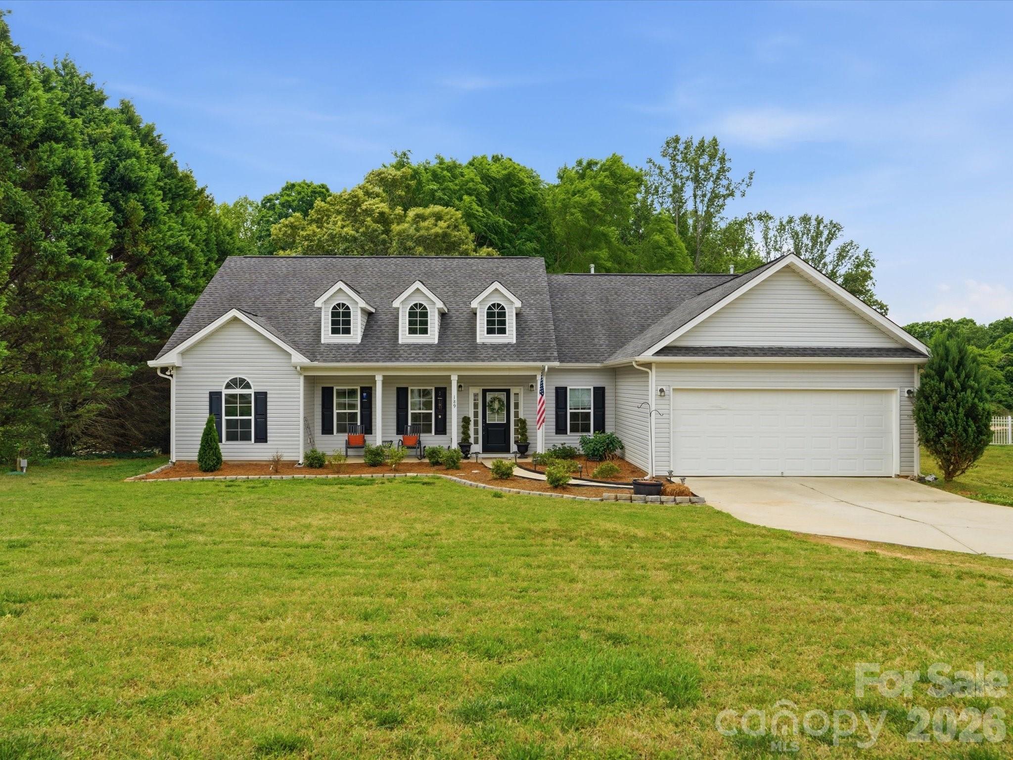 There’s a certain kind of peace you only find in the South — the kind that greets you the moment you turn down Wesley Amaker Road and pull into this welcoming, one-acre slice of Carolina countryside. This true ranch home offers the comfort of single-level living, the ease of a thoughtful layout, and the quiet charm of life just far enough out to breathe, yet close enough in to stay connected.

Step inside and you’ll find a bright, open living space that feels instantly familiar — warm floors underfoot, natural light pouring in, and a gentle flow that makes everyday living feel effortless. The kitchen sits at the heart of the home, ready for Sunday suppers, holiday baking, and all the little moments in between. Three comfortable bedrooms and two full baths give everyone their own space, while still keeping the home cozy and connected.

Out back, the acre truly shines. Whether you dream of a garden, a firepit under the stars, a play space, or simply room to roam, this land gives you the freedom to create the lifestyle you’ve been craving. No HOA, no fuss — just good Carolina earth and the space to make it your own.

Located in a peaceful pocket of York, you’re close to town conveniences while still enjoying that “out in the country” feeling buyers love. It’s the best of both worlds — quiet mornings, wide skies, and the kind of slower pace that feels like home.

If you’ve been waiting for a place that offers comfort, charm, and room to grow, this ranch on Wesley Amaker Road is ready to welcome you in.