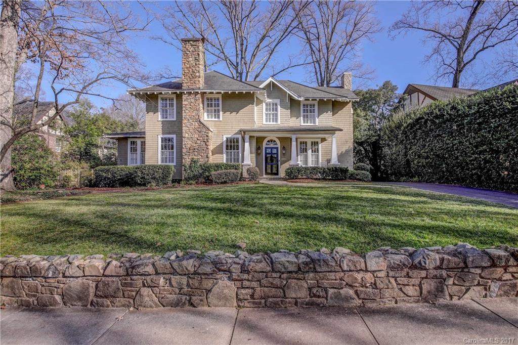 Rare 1927 home with .5 acre lot.  Gorgeous formal LR, DR, Sunroom and Parlor.  Todays living chefs kitchen with double refrigerators, gas stove and large island open to huge great room with fireplace and built ins.  Covered porch over looking large, beautiful backyard. Guest suite or 2nd master on main.  Second floor has Master suite with double walk-in closets.  3 additional bedrooms and 2 baths. Finished walk up attic great for Playroom. Finished basement used as wine cellar and office.Carport