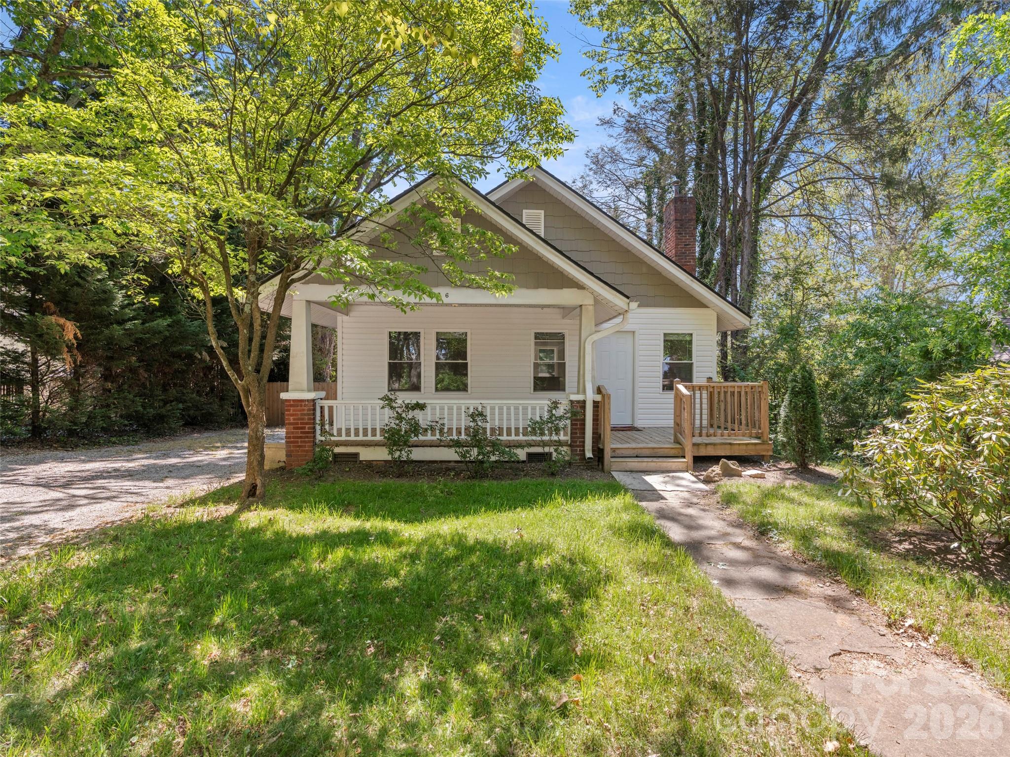 Turnkey home with a fully fenced backyard in a highly convenient South Asheville location just off Hendersonville Rd. This bright, open floor plan has been extensively updated with new electrical, plumbing, insulation, roof, drywall, flooring, and outdoor spaces.

The home offers easy everyday living inside and out. Enjoy your morning coffee on the covered front porch or unwind on the private back deck overlooking the spacious, level backyard. The newly installed 8’ privacy fence and gated entry create a secure, secluded outdoor space—ideal for pets, gardening, or entertaining.

Close to shopping, dining, I-40, and daily amenities while still offering a tucked-away feel—this one hits the sweet spot.