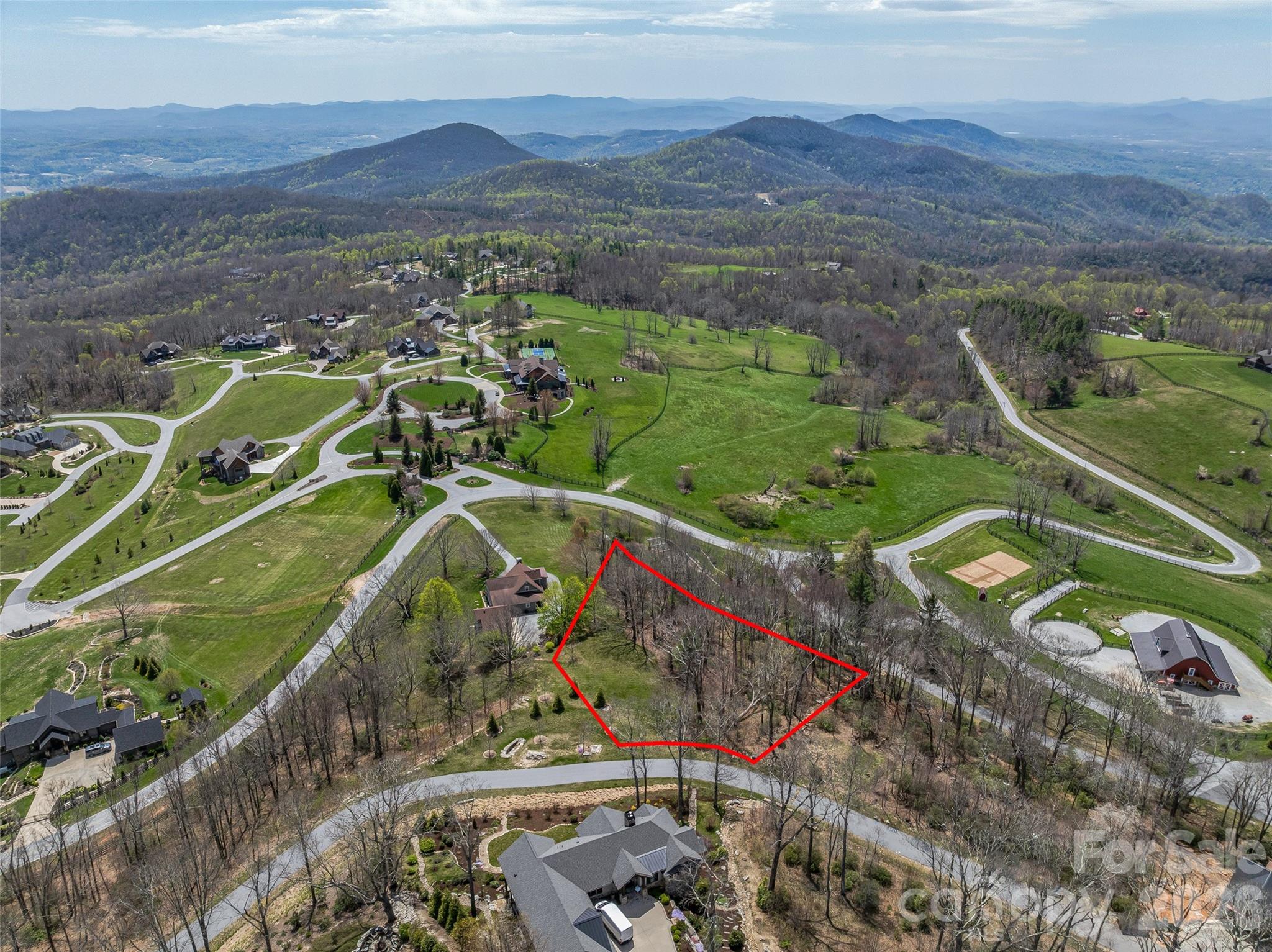 Stunning homesite with a gentle building site. Ready for construction with access to city water, and AT&T fiber optics. Lot has great southern exposure with long range views. Walkable to the Grand Highlands lodge, which is home to luxurious indoor/outdoor gathering spaces, state of the art fitness, sports pub, expansive catering kitchen, game room, library and media room. Tennis/Pickle Ball Court, firepit, and deluxe dog park within a few steps, as well!