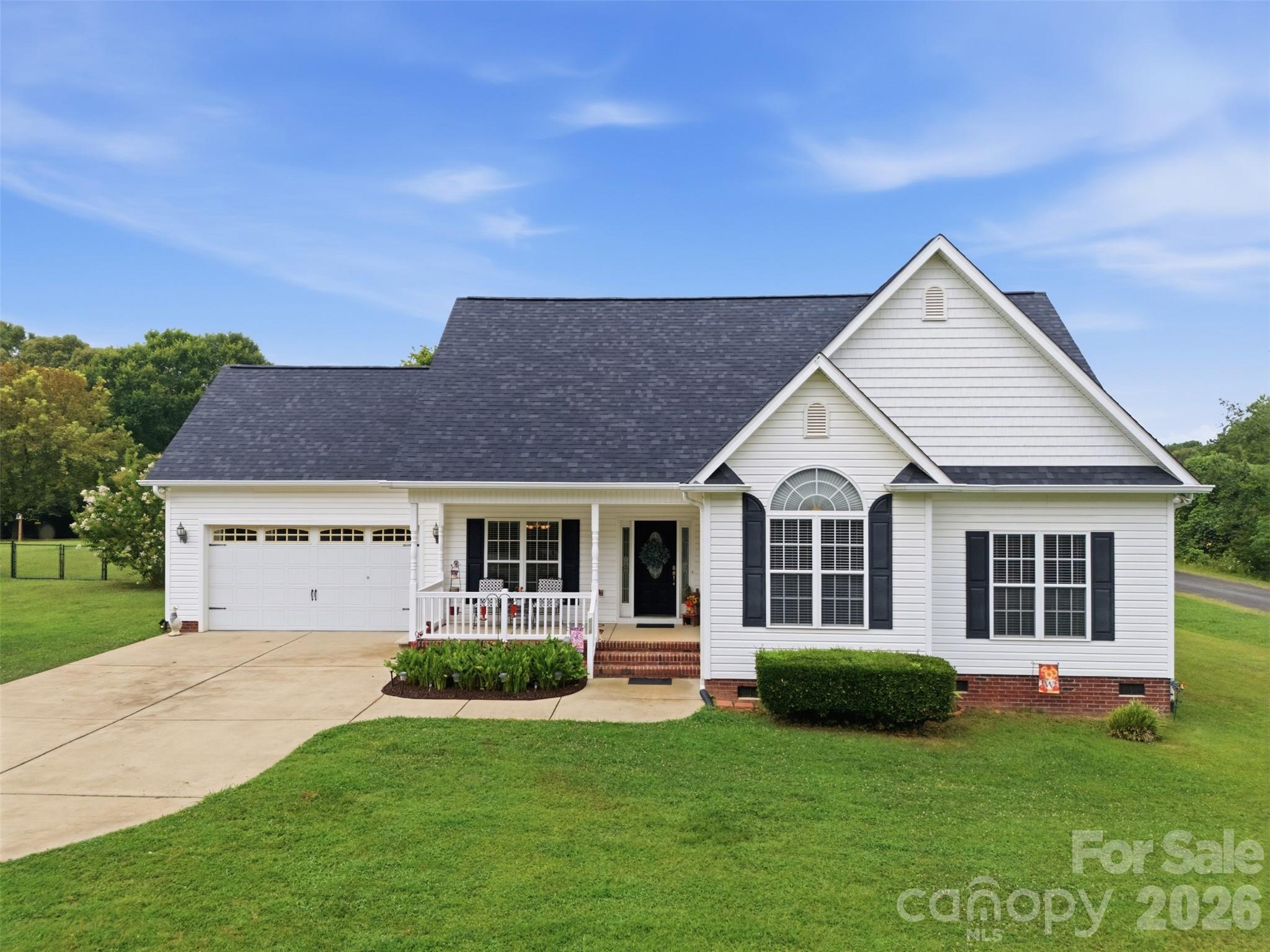 Welcome home to this beautifully maintained, one-level retreat in peaceful Catawba, SC.  Situated on a spacious 1-acre corner lot with no HOA, this property offers the freedom and privacy of country living and only minutes away from all the amenities you would want!  

Step inside to find beautiful wood flooring, abundant natural light, and soaring vaulted ceilings that enhance the living room, kitchen, and primary suite. The kitchen features granite countertops, ample workspace, a breakfast island & nook.  Additionally you will find a separate formal dining room.
The split-bedroom floor plan provides added privacy, with the primary suite tucked away from the two secondary bedrooms. The spacious primary suite features a vaulted ceiling, generous walk-in closet, and private en suite bathroom.
Enjoy outdoor living on your low-maintenance composite deck, or expansive level backyard. The property also includes an attached 2 car garage along with a  16 X 24  custom building complete with concrete flooring, side bay garage door, electricity & water - offering endless possibilities as a workshop, home gym, hiding spot, hobby space, or additional storage.  New roof installed May, 2026.

Located just minutes from the Catawba River, Landsford Canal State Park, area golf courses, and outdoor recreation.