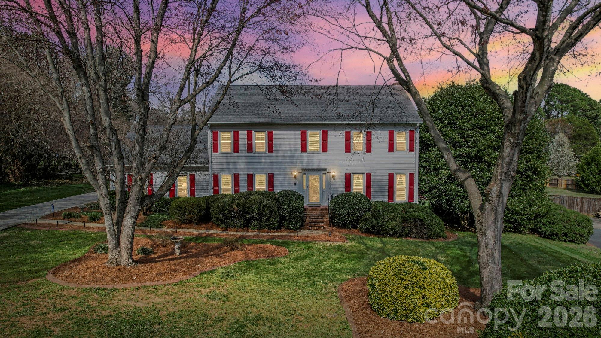 With Everything This Home Has to Offer...we are practically giving it away at this price point! Around 4,000 sq ft with 3,176 sq ft heated living area on a .71-acre lot—priced under $670K. The space, updates, and layout are all here… the only thing missing is the right buyer walking through the door.

Step inside to a two-story foyer with a vaulted ceiling and an elegant chandelier that sets the tone for this impressive home. You'll immediately notice the new LVP flooring throughout, fresh paint, and thoughtful updates at every turn.

The main level offers the flexibility today's buyers need—formal living and dining rooms flow seamlessly into a comfortable family room with a white painted brick fireplace that creates the perfect gathering space. The updated galley kitchen features sophisticated gray cabinetry, granite countertops, stainless steel appliances including a side-by-side refrigerator, and a contemporary glass tile backsplash. Natural light pours into the breakfast area from large windows, making it a space you'll actually use every day.

Upstairs, the primary suite feels like its own retreat—a spacious bedroom with a private sitting area and office space, plus a renovated en-suite bath that's been transformed from dated 90s style into a modern spa-like sanctuary. The renovation includes a luxurious walk-in shower with frameless glass enclosure, dual vanities with white quartz countertops, large illuminated mirrors, and elegant contemporary finishes in soothing gray and white tones. Additional well-sized bedrooms provide room for family, guests, or work-from-home setups.

Unique architectural details include integrated LED stair lighting on each riser—a premium safety and design feature that creates beautiful ambient lighting throughout the stairwell. Accent walls add modern sophistication to the home's neutral palette.

Need even more space? The finished third floor delivers—perfect for a bonus room, media space, gym, or whatever your lifestyle demands, PLUS it is already plumbed for a new bathroom install.

Outside, enjoy a private patio and large .71-acre lot ideal for relaxing or entertaining, four car parking space, plus a rear-load two-car garage for added functionality and curb appeal.

Major system updates already handled means you can move in with confidence and peace of mind.

Homes with this much space, flexibility, privacy, and quality updates at this price point in Mint Hill are hard to find—and even harder to ignore.

?? If you've been waiting for the right opportunity, this is it. Schedule your showing today before someone else sees the value first.