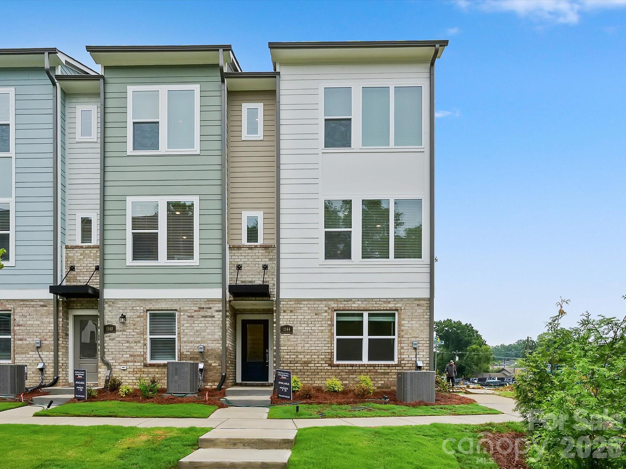 Tucked along a peaceful treeline, this three-story end-unit townhome by David Weekley Homes perfectly combines modern design, energy efficiency, and natural serenity. Featuring three bedrooms and three-and-a-half baths, this beautifully crafted home offers a bright and open floor plan with 9-foot ceilings, large windows, and elegant Shaw LVP flooring that enhance its inviting atmosphere.
The chef’s kitchen is both stylish and functional, showcasing granite countertops, 42-inch cabinets, and a spacious island—perfect for entertaining or enjoying everyday meals. Step out onto your private balcony to take in tranquil treescape views, offering a relaxing retreat right at home.
Upstairs, the primary suite impresses with a large walk-in closet and a luxurious en-suite bath. Built with EFL Certified construction, this home delivers long-lasting comfort and energy efficiency to help reduce utility costs.
Stylish, efficient, and surrounded by natural beauty, this home in Central Living at Craig truly has it all.