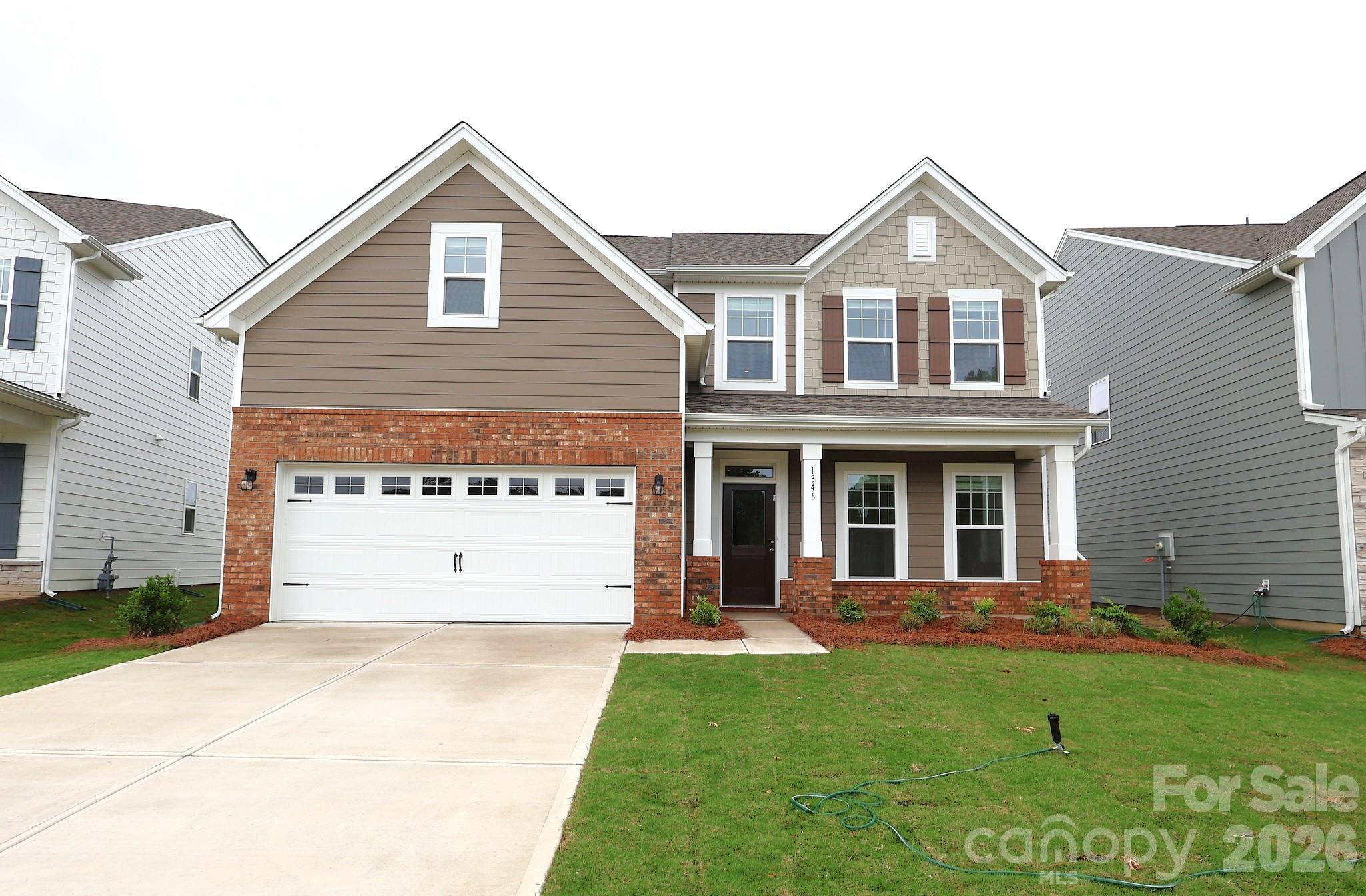 Welcome to the Erie at Canterbury Station! This community is located just minutes from Wingate University & offers all the amenities needed for a functional lifestyle. This beautiful home is set to impress with modern features & elegance. Entering the home from the front covered porch, you are greeted with an inviting and homey foyer. Off to the side, you'll find a main level bedroom with a full shared bathroom. The home will open up when entering your main living area. The kitchen is equipped with stainless steel appliances, including a stainless steel refrigerator, kitchen island and quartz counter tops. The breakfast area allows for sit down meals & extra space. Walk out the sliding doors to your extended patio to enjoy entertaining or a morning coffee. The family room is spacious and open, allowing for a sectional as well as additional furniture. Throughout the main living areas is easily maintainable EVP flooring for easy cleaning. The windows throughout the home have been accented with 2" faux wood blinds for an extra layer of luxury. Upstairs you will find 2 additional bedrooms, a shared bathroom and the laundry room, complete with a washer and dryer. The spacious loft is perfect for an additional living space. The Owner's suite is designed to maximize elegance. With plenty of natural lighting, you'll find relaxtion will come easy. The walk-in closet allows for maximum space for all your wardrobe needs. Finally, the en-suite is nothing short of spa-like. With a dual vanity, private toilet area & a tiled shower. Welcome to your new home!