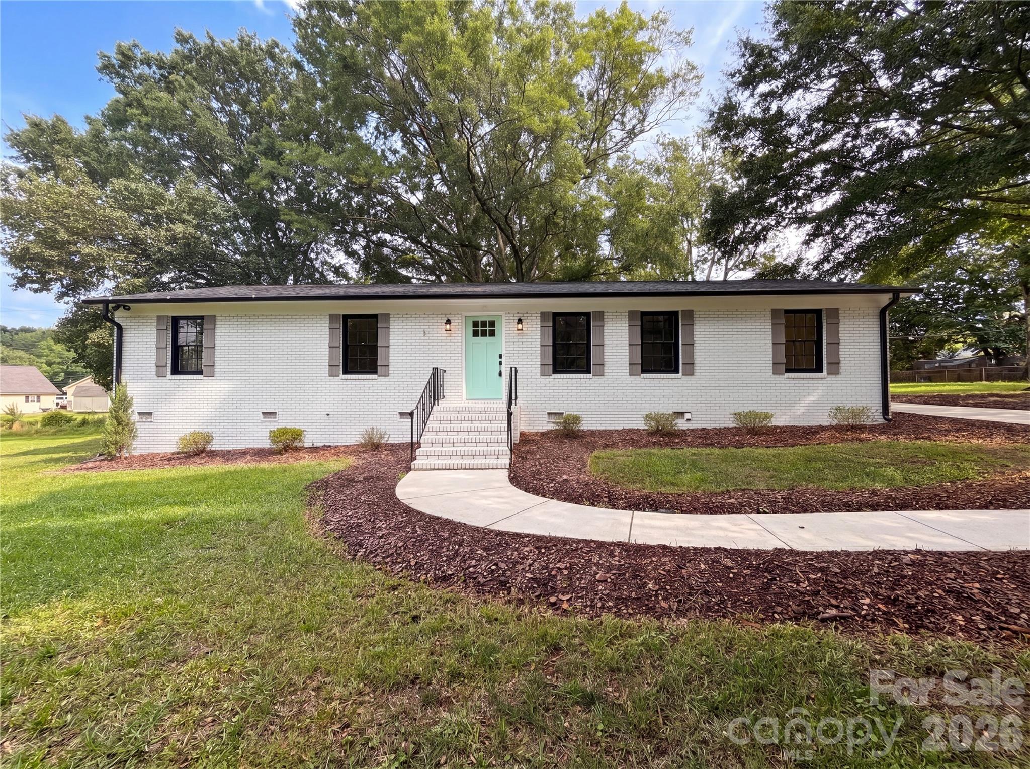 Meet 141 Greenbriar Dr, a residence arranged for everyday practicality, where the kitchen features an accent backsplash and all stainless steel appliances. The property provides a covered patio, complemented by a storage shed for additional utility. This updated property blends modern style with practical outdoor living—don't miss it.. Included 100-Day Home Warranty with buyer activation