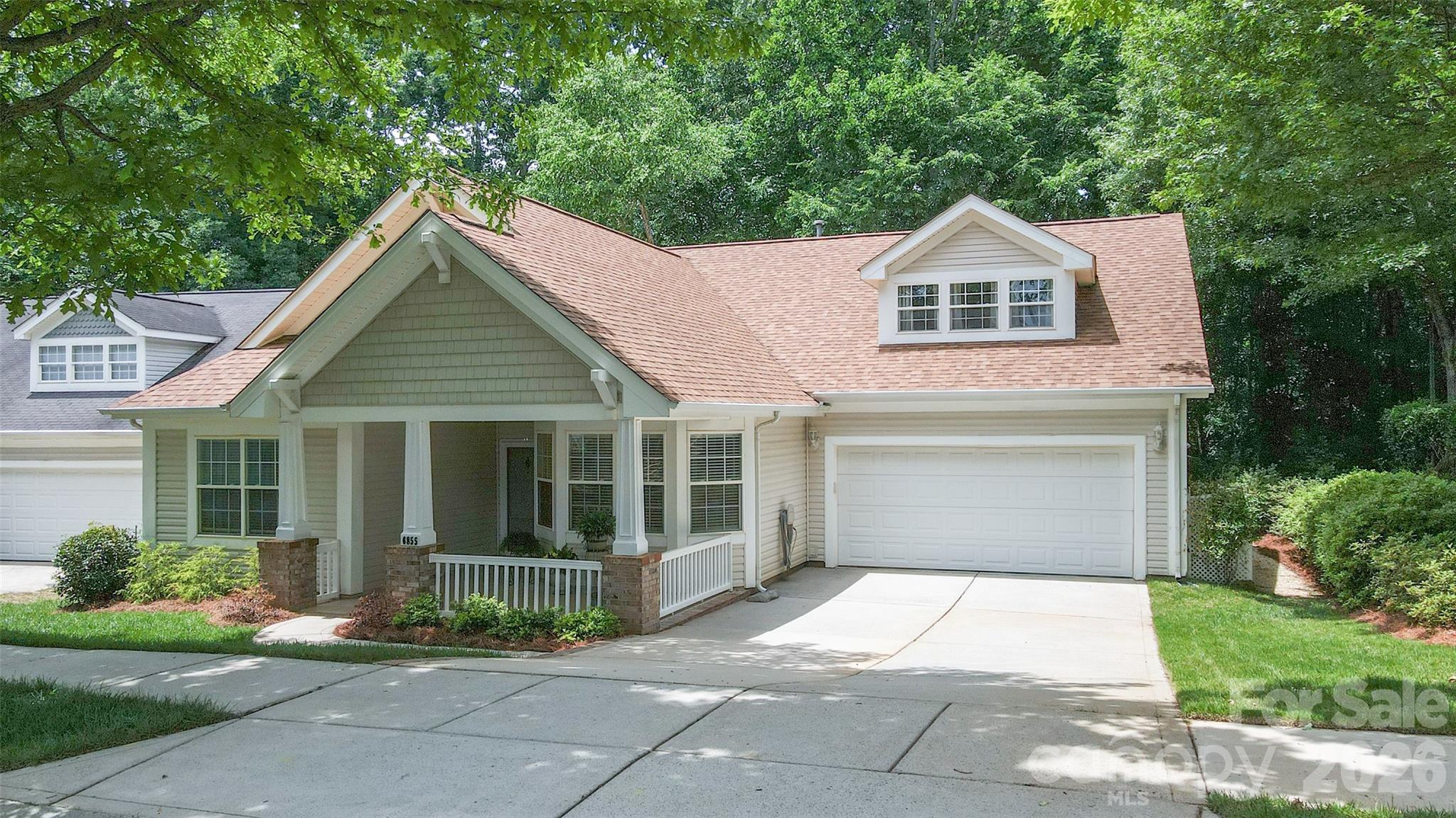 Meticulously Maintained & Thoughtfully Updated – Move-In Ready in Sought-After Huntersville

Welcome to 6855 Colonial Garden Drive, a beautifully cared-for residence that perfectly blends timeless charm with modern upgrades. This home has been lovingly maintained by its owners, who have invested in significant improvements over the years—resulting in a property that's truly turnkey.

Step inside to discover rich hardwood flooring flowing throughout the main level, complemented by a freshly painted interior (2022) that provides a crisp, neutral canvas. The updated kitchen is a standout, featuring newer countertops, stainless steel appliances (range, refrigerator, dishwasher, and microwave), a stylish tile backsplash, and modern fixtures—all completed in 2022.

Extend your living space outdoors to the custom screened porch addition (2017), complete with new flooring (2023)—an ideal spot to enjoy your morning coffee or unwind in the evenings. The professionally landscaped backyard with irrigation system creates a private retreat, enhanced by mature hedging for added privacy. The lot is partially wooded and includes 15 different varieties of low maintenance flowering shrubs and trees. 

Major systems have been addressed, giving buyers peace of mind:

New roof (2020)
HVAC system (2018)
Updated plumbing including both toilets, pressure valve, and emergency shut-offs (2026)
Additional highlights include a remodeled home office and laundry room, front door security camera, and wildlife guards for added protection.

Located in one of Huntersville's most desirable neighborhoods, this home offers easy access to top-rated schools, Lake Norman, shopping, dining, and major commuter routes.

Don't miss this opportunity to own a home where the hard work has already been done.
