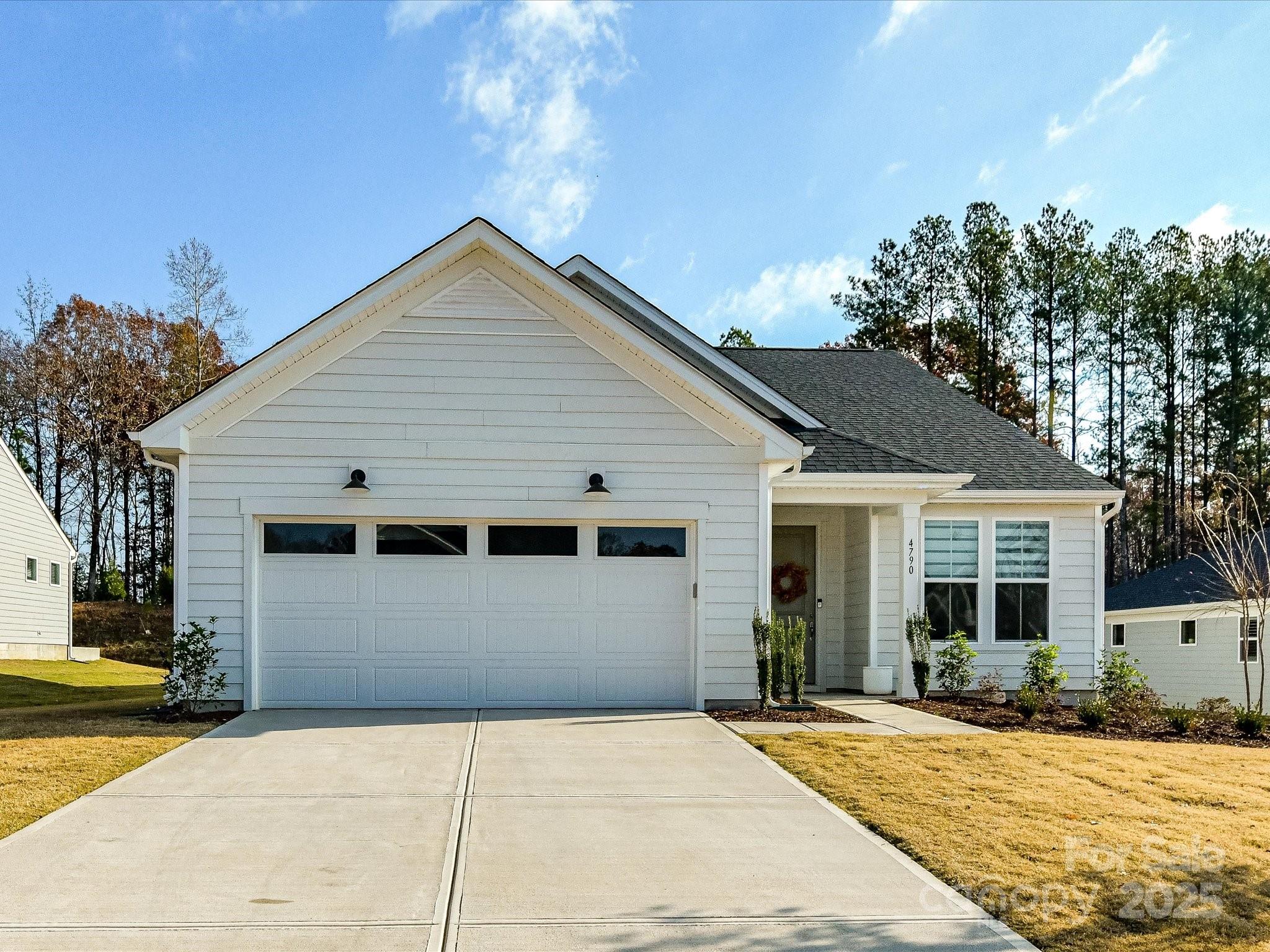 Don't miss this new home in Kinsdale-the latest and hottest neighborhood in Indian Land! This newly constructed home has EVERYTHING a buyer would want and more. Get the benefits of a new home, all the warranties on appliances and the thoughtful touches installed by the current owners. The stunning kitchen includes gleaming white cabinets, quartz countertops, a white designer backsplash, high end Kitchen Aid appliances, a gas cook top with corresponding stainless-steel hood, double ovens and a white farmhouse sink. This bright, airy and open floorplan offers LVP flooring throughout the main floor starting in the office, running through the flex space and continuing throughout the living room area and halls. The large primary bedroom, with a stunning bath, is located on the main floor along with two additional bedrooms and their shared bathroom. Another bedroom, full bath and large bonus room are located on the second level. Enjoy the fashionable lighting in the common areas, epoxied floor in the garage and custom shades both blackout and light filtering within each room. These unique additions will not be found within newer constructed homes in the area. This lovely home is located in the top-rated Indian Land school district with convenient access to shopping and dining and a direct route to Charlotte, NC. The HOA fees include trash, WiFi and amenities that are currently under construction. You do not want to miss out on this home built for you to move right in.