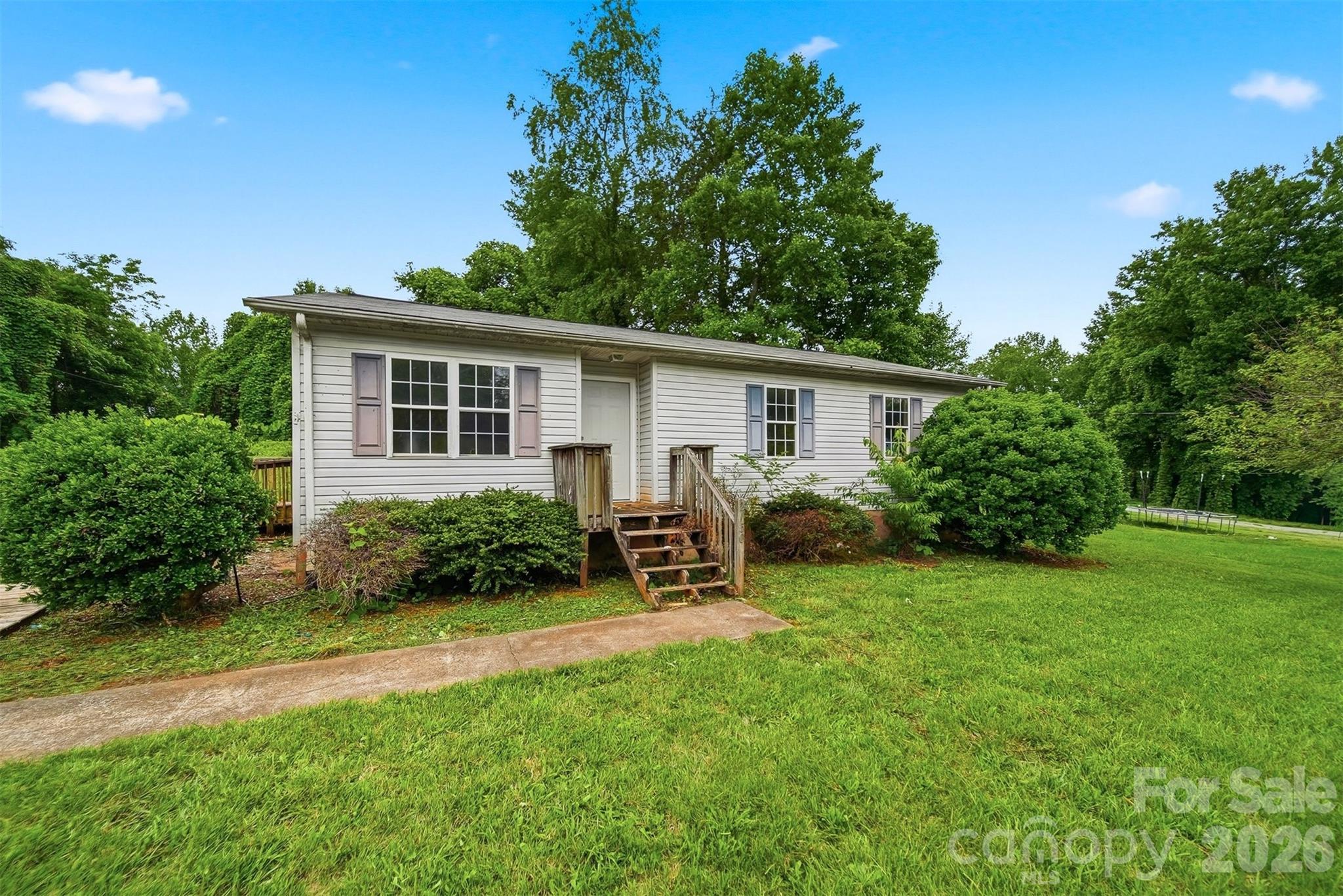 Investor Special with great potential! This 3-bedroom, 2-bath home offers an excellent opportunity for investors, flippers, or buyers looking to add their personal touch. The home features a functional floor plan with spacious living areas and ample room for renovation and updates. Situated on a generous lot, the property also includes a detached outbuilding behind the home, providing valuable space for storage, a workshop, or additional project potential. Conveniently located with easy access to local amenities, shopping, and schools. Property is being sold as-is. Bring your vision and unlock the possibilities this property has to offer!

CAUTIONS!! Be careful walking through home.  Floors are soft in some places! Do not walk up front steps!!