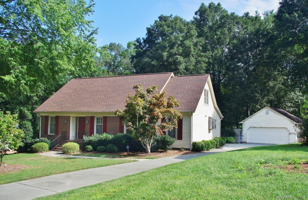Well maintained 1 owner home in a great location has mature landscaping & a 2 car garage w/ a workshop! Features formals, a den w/ FP, lg bdrms, plantation shutters & lots of storage. Nice hdwd flrs accent the main level living areas. Cozy paneled den features an exposed beam ceiling. Kitchen offers raised panel cabs & a grdn window. Updated mstr ste on main level has a walk-in clst & custom tile work in the bath. Floor-to-ceiling sliding windows let you enjoy the enclosed porch all year! No HOA