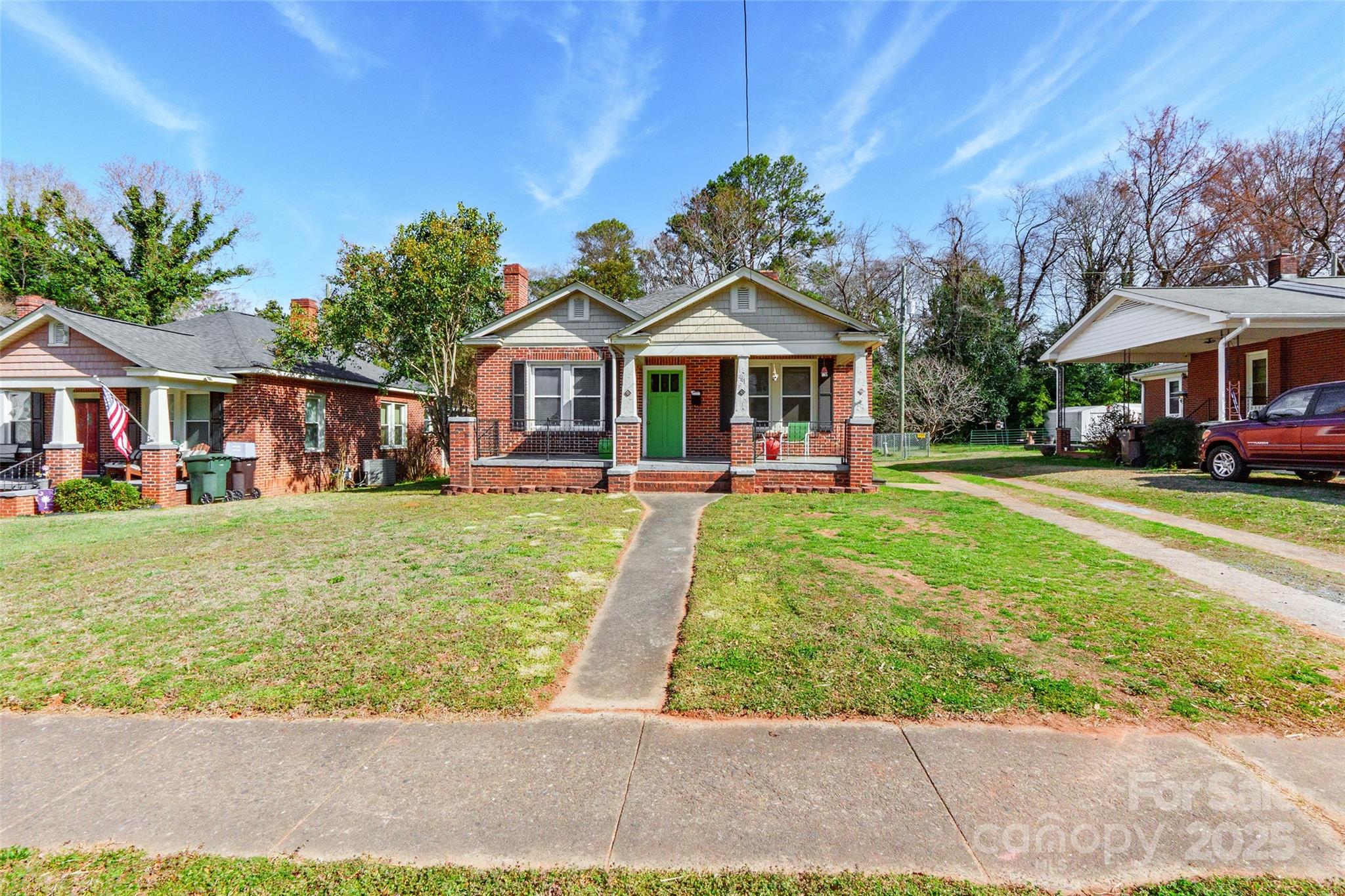 This adorable 2 bedroom, 1 bath craftsman bungalow features a covered front sitting porch, perfect for relaxing outdoors. Inside, you'll find beautiful wood floors in the main living areas, with a bright dining room off the kitchen that adds to the home's charm. The kitchen also offers a convenient breakfast bar. Outside, the large, flat, and fully fenced backyard provides plenty of space for outdoor activities. Situated in a prime Rock Hill location, this home is just minutes from downtown, with a great selection of restaurants and shopping nearby.