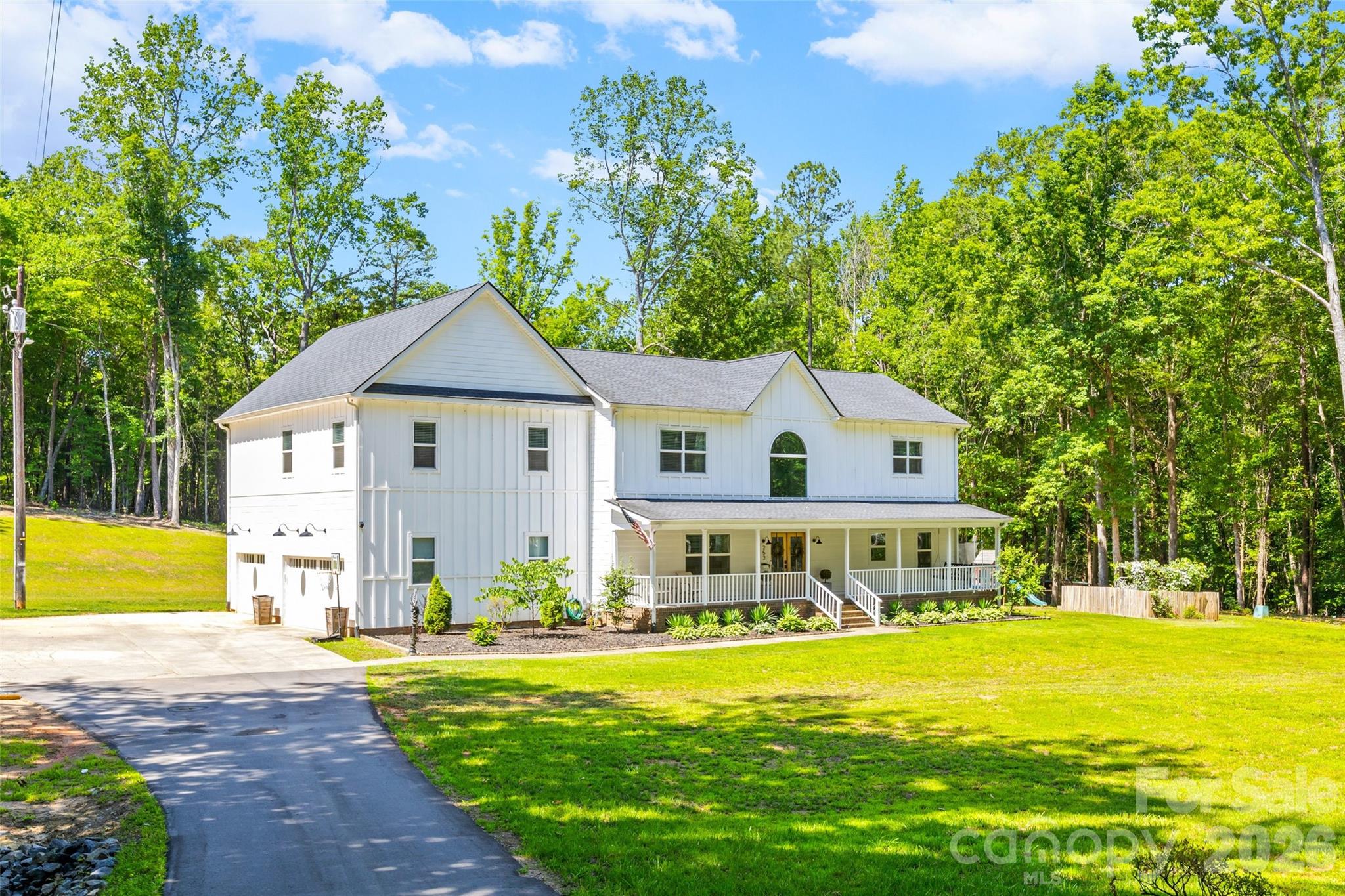 Location, Location, Location. Discover this private 3-acre estate in highly sought-after Indian Land, SC, just minutes from Charlotte, NC—offering the perfect balance of privacy and convenience.

This beautifully remodeled home (2021) features 4 bedrooms, 3.5 bathrooms, a dedicated home office, and a spacious bonus room with an adjoining bedroom—ideal for a guest suite or in-law suite.

The gourmet chef’s kitchen is designed for entertaining, showcasing a massive stone island, modern farmhouse finishes, a large walk-in pantry, and a formal dining room. The open-concept floor plan offers multiple living areas that feel both expansive and inviting.

Step outside to a large stamped concrete patio with a fire pit, perfect for outdoor entertaining and relaxing evenings. The expansive backyard offers ample space and is ready for a future pool.

The luxurious primary suite provides a true retreat, featuring a spa-like bathroom with a freestanding soaking tub. Upstairs, you’ll find three additional generously sized bedrooms and a conveniently located laundry room.

A large 3-car garage offers plenty of space for vehicles, storage, and hobbies—perfectly complementing the acreage and lifestyle this property provides.

Don’t miss this rare opportunity to own a private estate in Indian Land with close proximity to Charlotte—schedule your showing today before it’s gone.