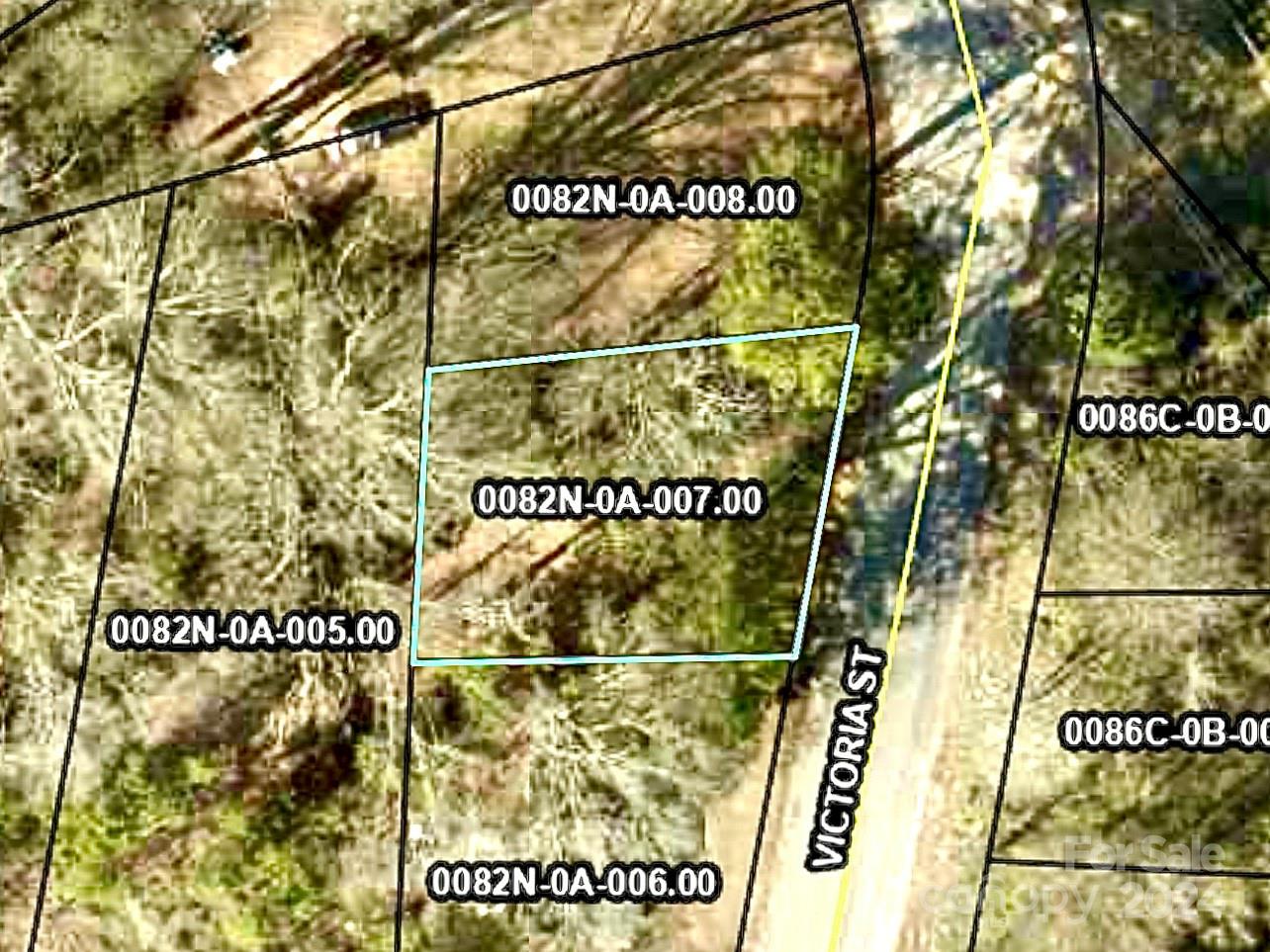 This property is located just minutes away from local shopping centers and other conveniences. It is a beautiful wooded lot, perfect to build a starter home or as an investment opportunity.  
..Please inspect this property and validate it for any use that you intend it for prior to writing an offer.  Lot has access to county water.  Perc test needed.
