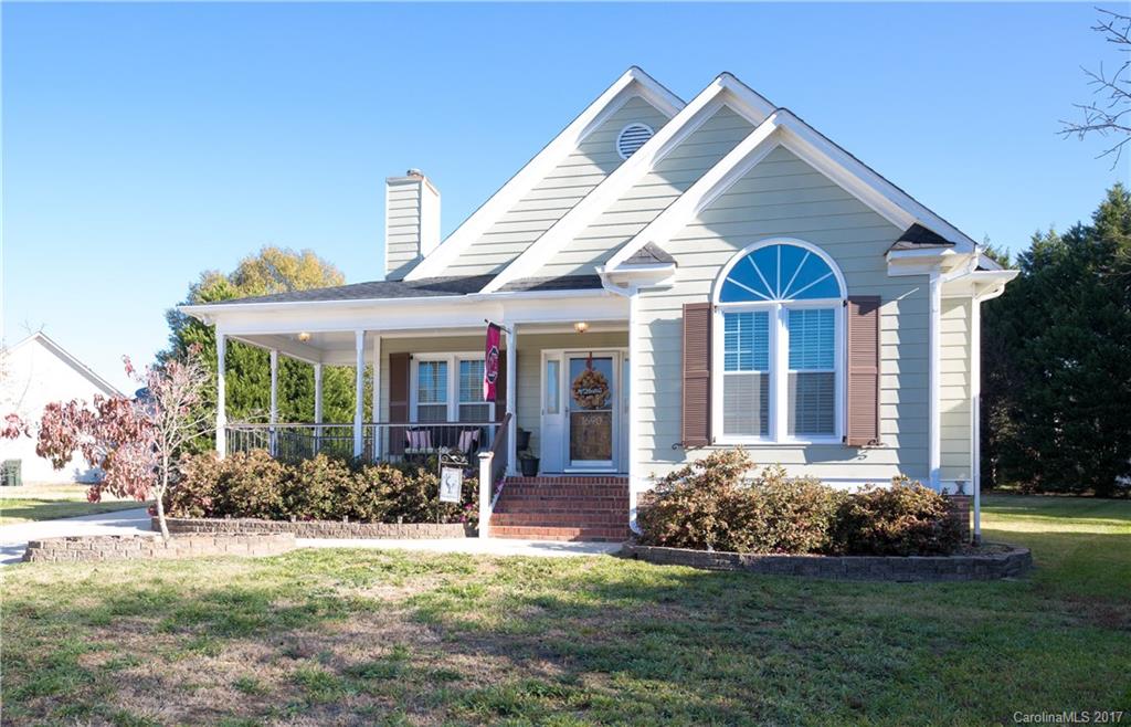 Southern charm. Prime location. Ranch living. Open floor plan. Numerous upgrades. And more! Welcome home to this move-in ready oasis featuring charm and character throughout including a whirlpool tub, laminate wood flooring, extensive crown molding, tile gas fireplace, and vaulted ceilings. Come inside to see more!