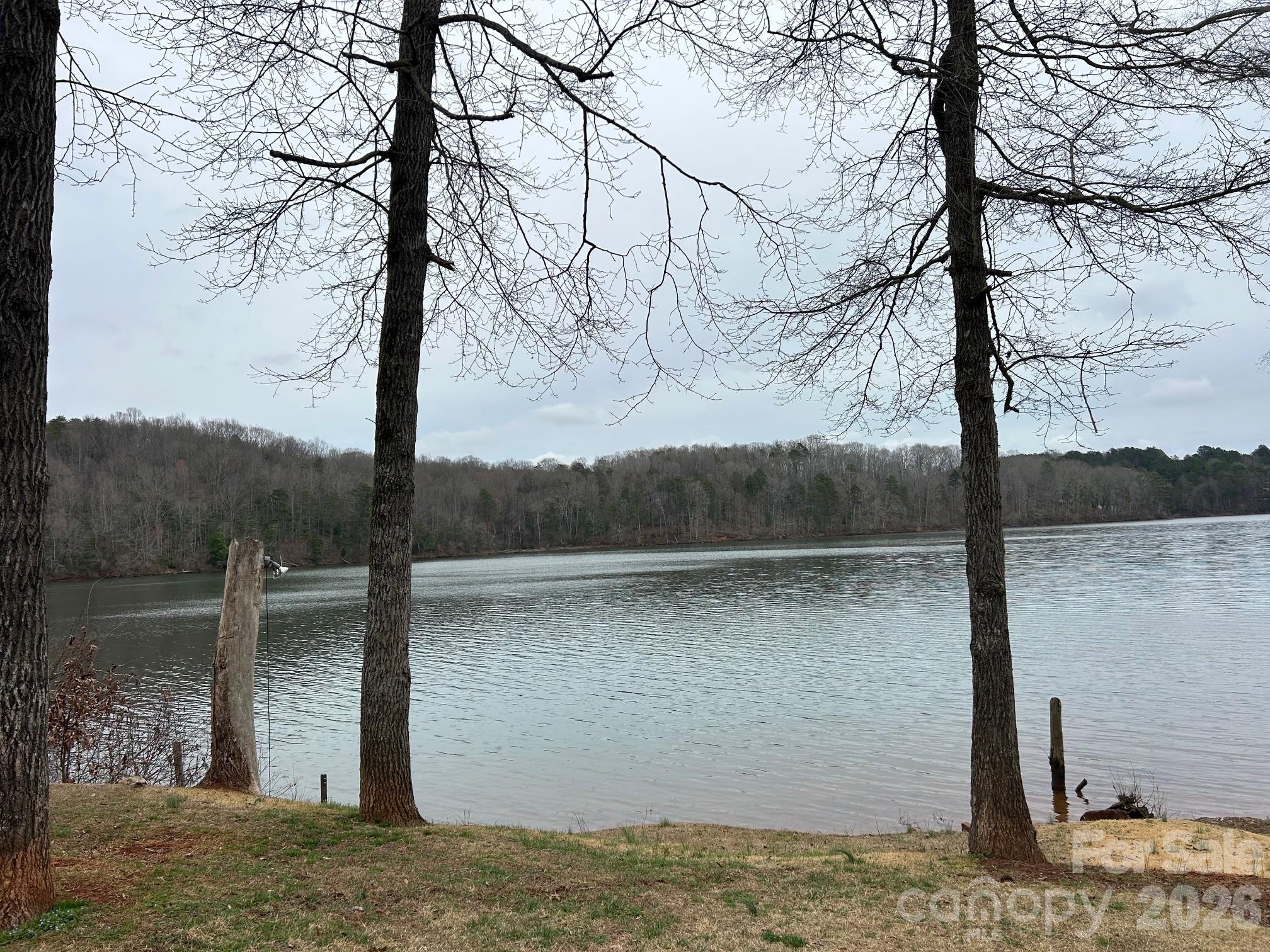 Escape to a cozy cabin located on Lookout Shoals Lake. Perfect as a weekend getaway, investment property, or full-time residence. Cabin has a large living room, Kitchen and Dining area, 1 bedroom, 1 bathroom, and flex space for storage or living area. Outside, the property truly shines. The generous lot offers plenty of room for outdoor entertaining, or simply enjoying the serene lake views. Whether you're sipping coffee in the morning or watching the sunset over the water, this setting is hard to beat. With direct access to Lookout Shoals Lake, you'll enjoy boating, fishing, kayaking, and all the perks of lake life right at your doorstep. Boat Ramp is on the property for easy launching of watercraft.
