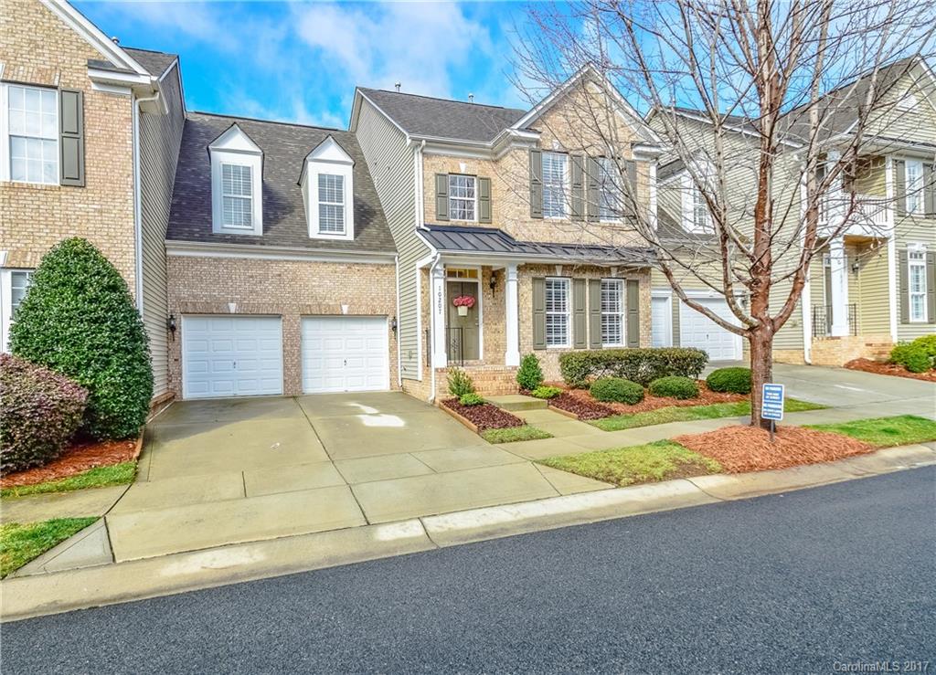 MOTIVATED SELLERS! Beautiful move in ready townhome in the sought after Skybrook neighborhood! Enjoy gorgeous sunsets overlooking the golf course from your large porch. Definition of meticulously maintained! Open floor plan, granite countertops, SS appliances, vaulted and tray ceilings, wainscoting, and many more added details! Master suite on main floor with sep garden tub/shower, walk in closet, and double vanity. HUGE basement with plenty of room for entertaining and large extra storage room.