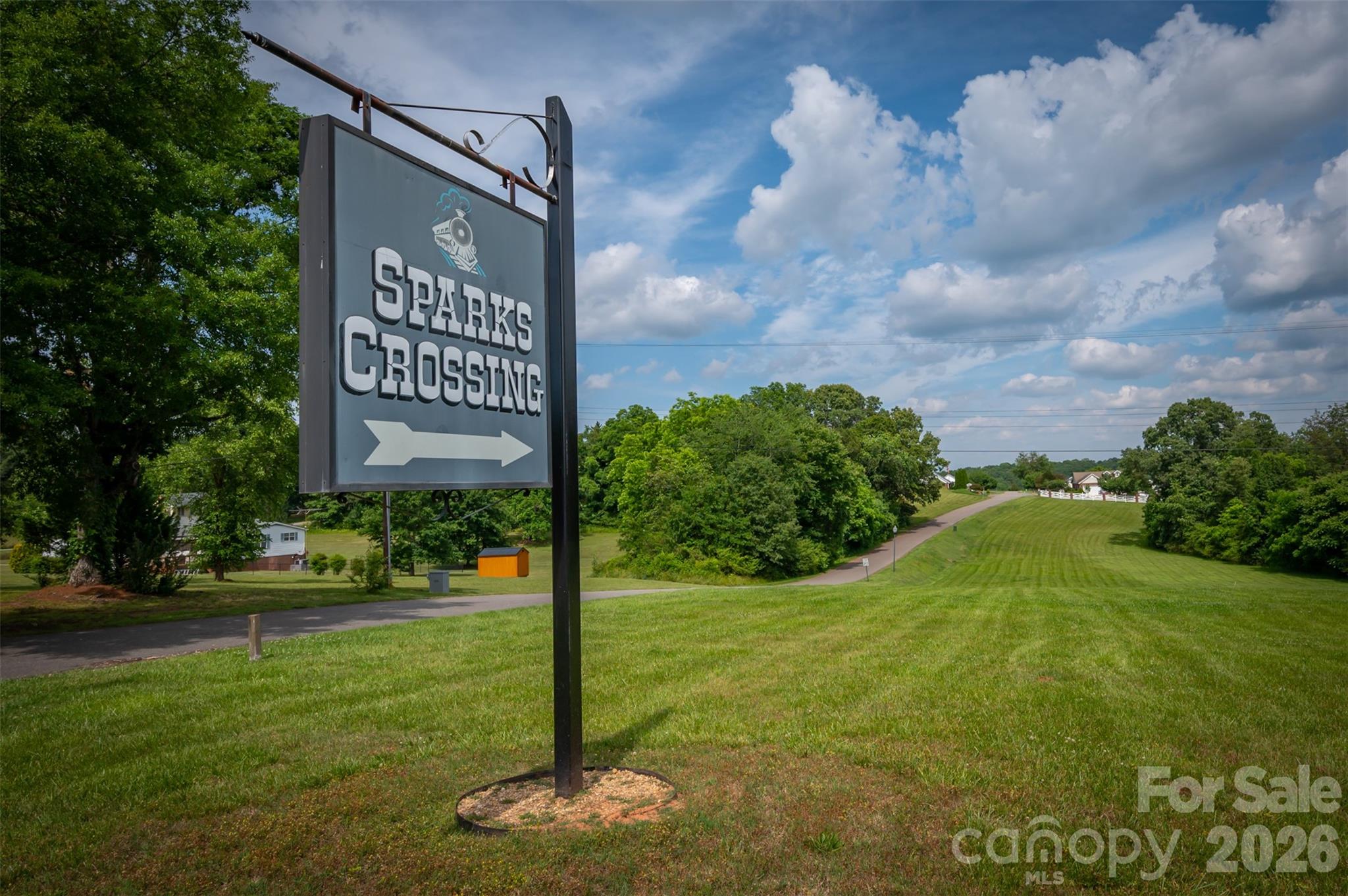 Nestled in the heart of Spindale NC, this 0.30-acre vacant lot is located in Sparks Crossing, a beautifully maintained 55+ community designed for comfort, convenience, and low-maintenance living. Sparks Crossing offers a truly easygoing lifestyle with HOA-maintained landscaping, two stocked ponds, underground utilities, and public water and sewer. The community also provides direct access to the Thermal Belt Rail Trail, perfect for walking, biking, and enjoying the outdoors. This is only one of the 23 available lots — the lots are ideal for individuals looking to build their dream retirement home or for developers interested in completing this growing community. Don’t miss the opportunity to enjoy quiet, carefree living in this peaceful, well-appointed 55+ community. Schedule your tour today and make Sparks Crossing your new home!
