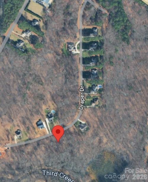 Looking for the perfect place to build your dream home? Bring your vision to life on this beautiful 0.8-acre wooded homesite located in the desirable Wood Bridge Estates community in Statesville. Situated on a quiet cul-de-sac street and surrounded by mature trees and stunning custom-built homes, this lot offers the ideal combination of privacy, space, and convenience.

If you're searching for a smaller neighborhood with room between neighbors, Wood Bridge Estates delivers. The property previously received a septic permit for a 4-bedroom home (now expired), providing an excellent starting point for your building plans. Community CCRs require a minimum of 2,800 square feet of heated living space, including at least 2,000 square feet on the main level, helping preserve the quality and value of the neighborhood.

Bring your own builder with no time limit to build, or let us assist you through the construction process. Conveniently located near Highway 64, you'll enjoy easy access to shopping, dining, and everyday amenities while maintaining the peaceful setting of an established neighborhood. An adjacent lot is also available and may be purchased separately or together for additional privacy and possibilities.

Don't miss this rare opportunity to create the custom home you've always wanted in one of Statesville's most attractive established communities.