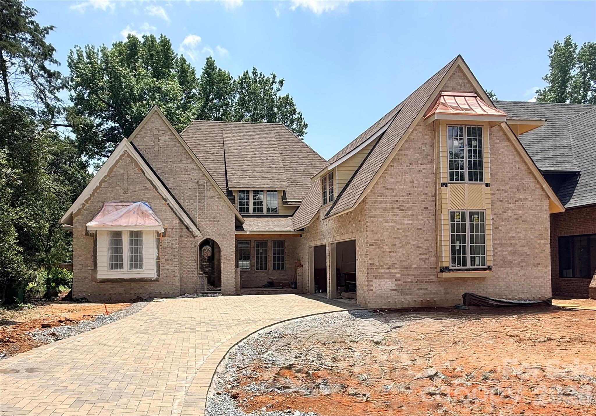 Construction is underway on this 5,600+ sq. ft custom home, and you still have the rare opportunity to make it your own. Unlike most new builds that are completed before you walk through the door, this one gives you the chance to personalize some of the details that matter most. From flooring, fixtures and colors, your selections can bring your vision to life.

Foundation is in & incapsilated, the rough carpentry, dimensional roof shingles. rough electrical, rough plumbing, rough HVAC, spray foam insulation, sheetrock is up and taped throughout.  Tile, trim carpentry, and interior doors are being installed now.

Now comes the fun: there still is a little time for you to choose some finishes and features that will turn this house into your dream home. If making every decision feels overwhelming, we can share our vision with you and you can decide how much or how little you’d like to customize.

The sooner you get involved, the more opportunities you’ll have to make those key selections and leave your mark on the home. Start gathering your inspiration—this is your chance to create something truly remarkable.

Projected construction completion date of May/June 2026.