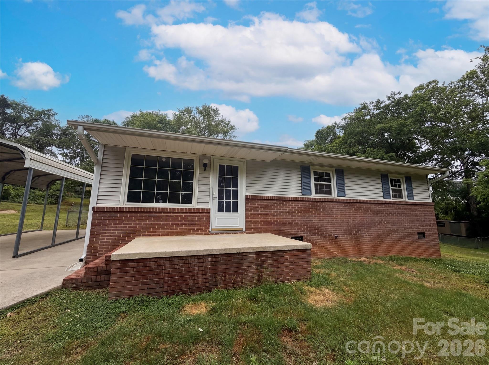 Great opportunity in Belmont! This 3-bedroom brick ranch offers a functional layout, spacious rooms, and plenty of potential to make it your own. Enjoy relaxing on the covered back porch overlooking the large yard with room for gardening, entertaining, or outdoor activities. With a little updating and personal touch, this home could truly shine. Conveniently located near shopping, dining, and everything Belmont has to offer, this property is full of possibilities!