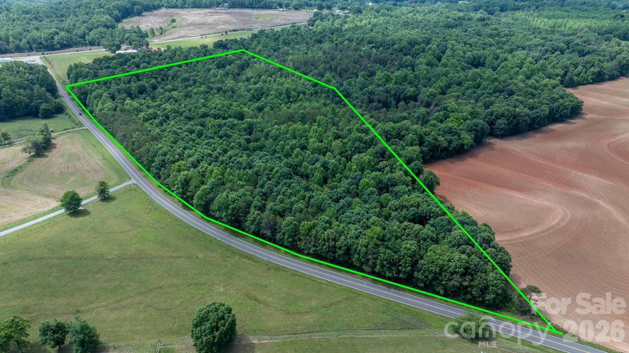 Discover the perfect blend of space, privacy, and possibility on this beautiful 23.07-acre property. Already approved with a 5-bedroom septic permit (perk test completed) and a full survey on file, much of the groundwork has been done, making it easier to start building your dream.

Whether you've envisioned a private estate, a peaceful country retreat, or the ideal mini farm, this expansive tract offers the freedom and flexibility to bring your vision to life. Enjoy the serenity of rural living with plenty of room for a custom home, gardens, livestock, recreational activities, and more.

Don't miss this rare opportunity to own a large acreage tract that is build-ready and full of potential. Come explore the possibilities and make your dream a reality.