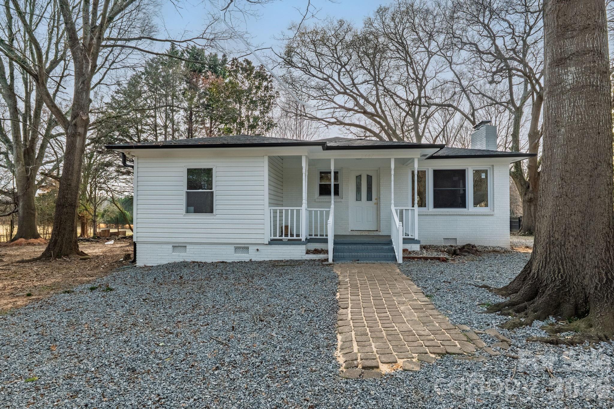 Welcome to 2447 Old NC 27 Hwy in Mount Holly — a beautifully refreshed home offering comfort, functionality, and privacy just minutes from town. This charming three-bedroom residence features a versatile small den/flex space positioned at the front bedroom, perfect for a home office or sitting area.

The home has been thoughtfully updated with all new appliances, new windows, and a 2025 HVAC system, providing peace of mind and energy efficiency for years to come. Natural light fills the living spaces, while the layout offers a practical flow for everyday living.

Situated on a private yard with mature trees, the setting feels tucked away yet remains conveniently located just 10 minutes from downtown Mount Holly, where you’ll enjoy local dining, shopping, and community events.

A solid opportunity for buyers seeking move-in ready convenience with easy access to town amenities.