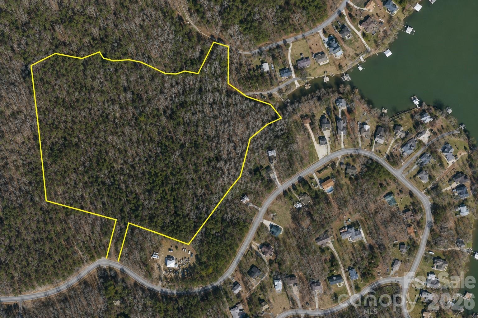 Unlock the potential of this rare ±18.98-acre tract near beautiful Lake Tillery! Offering public water and sewer availability, lake access, and the ability to be subdivided with approved plans, this property presents an exceptional opportunity for developers, investors, builders, or those seeking the perfect private estate.

With nearly 19 acres of land, the possibilities are truly endless. Create a thoughtfully designed residential community, develop multiple homesites, build a family compound, or design the private estate you've always envisioned. The combination of acreage, utility availability, and proximity to Lake Tillery makes this property a standout opportunity in today's market.

Enjoy the best of both worlds—peaceful surroundings with convenient access to boating, fishing, dining, marinas, and all the recreation Lake Tillery has to offer. Whether your vision includes a luxury estate tucked among the trees, a multi-generational family retreat, or a residential development designed to meet the growing demand for homes near the lake, this property provides the space and flexibility to bring those plans to life.

Large tracts with public utilities and development potential near Lake Tillery are becoming increasingly difficult to find. Don't miss this unique opportunity to secure a property that offers immediate value today and incredible possibilities for the future.