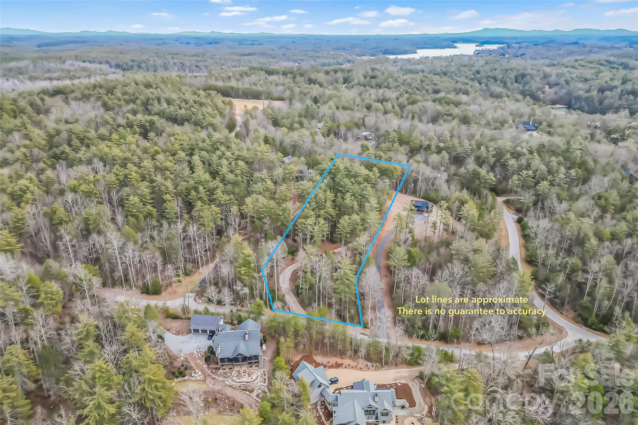 Enjoy the winter mountain and sunset views from the top elevation of this 1780 property. Driveway has been graded and graveled allowing easy access to the top of the lot.  Gentle slope to road and enough space to spread out and have privacy.  Although this lot does not have a deeded slip, 1780 does allow owners to rent their slips to to other residents. Camp Lake James membership conveys and includes fitness center, tennis and pickleball courts, walking trails, community dock, Camp facility and activities.  Lot have been perced for 4 bedroom home but there is no minimum square footage required.  Convenient to Lake James State Park, Fonta Flora State Trail and Pisgah National Forest.