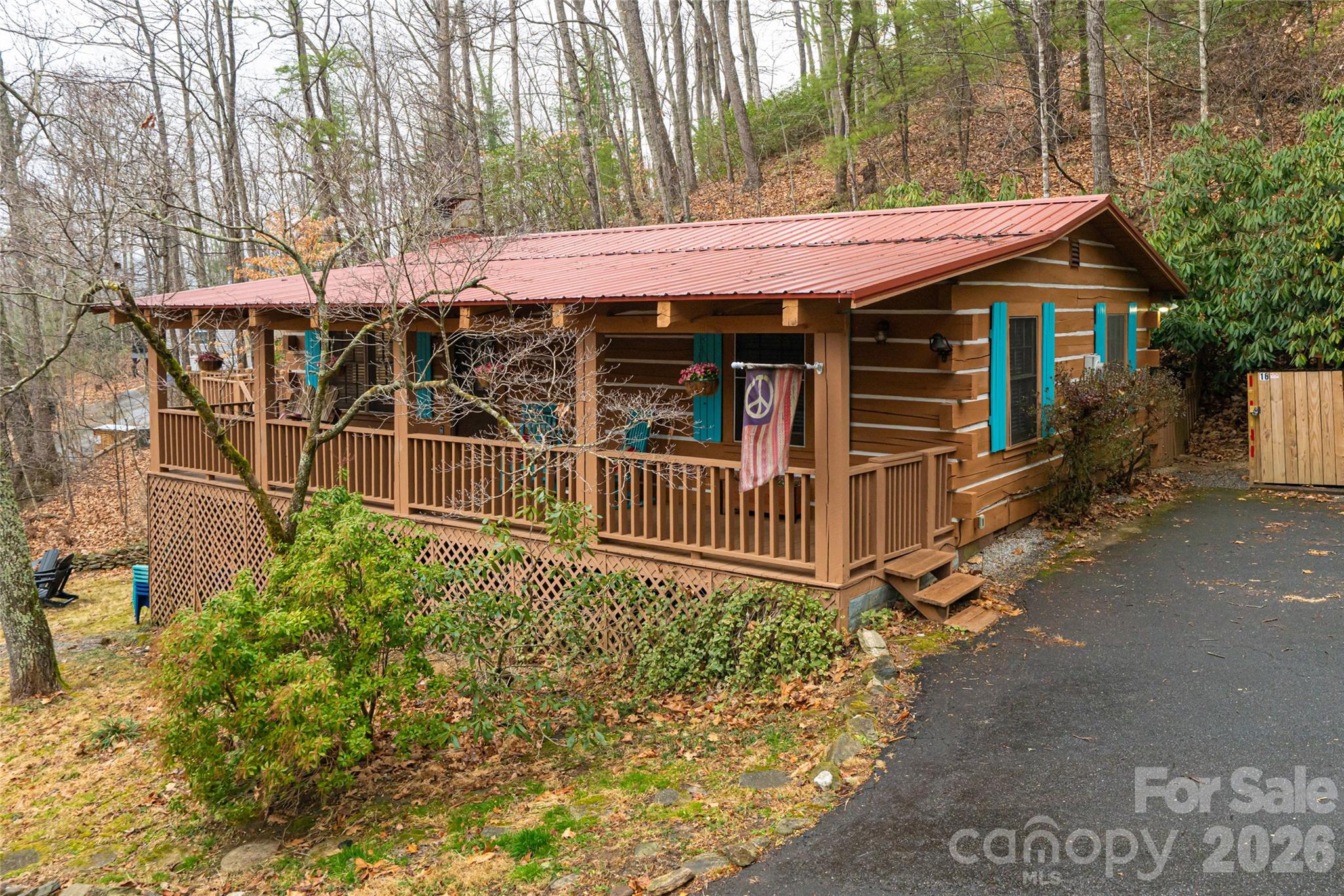 $56K+ Instant Equity! Eclectic Asheville area Log Cabin – Major Price Drop & No HOA!
Priced for immediate action at $358,900—well below its July 2023 appraised market value of $415,000! This private, beautifully maintained log cabin offers the ultimate blend of mountain lifestyle and strong income potential with NO HOA fees. This cozy 2BR/1.5BA retreat features privacy, seasonal long range mountain views, an authentic stone fireplace, a newer premium hot tub under dark starry skies, and a classic red metal roof. It serves as the perfect personal vacation spot while doubling as a high-performing short-term rental to offset a mortgage or generate passive wealth.

Financially resilient with a strong historical track record, this property provides a rare value-add opportunity. Buyers gain a massive operational advantage: the owner’s established, highly valued property management, maintenance, where housekeeping team is committed to staying on for a seamless, day-one transition. Offered fully furnished and turnkey.

Minutes from Lake Lure and (rebuilding) Chimney Rock, with scenic drives to downtown Asheville, Black Mountain, Hendersonville, and Tryon. Fast access to I-40, I-26, US-74/64, and Asheville Regional Airport. This motivated seller opportunity will not last—schedule your showing today!
