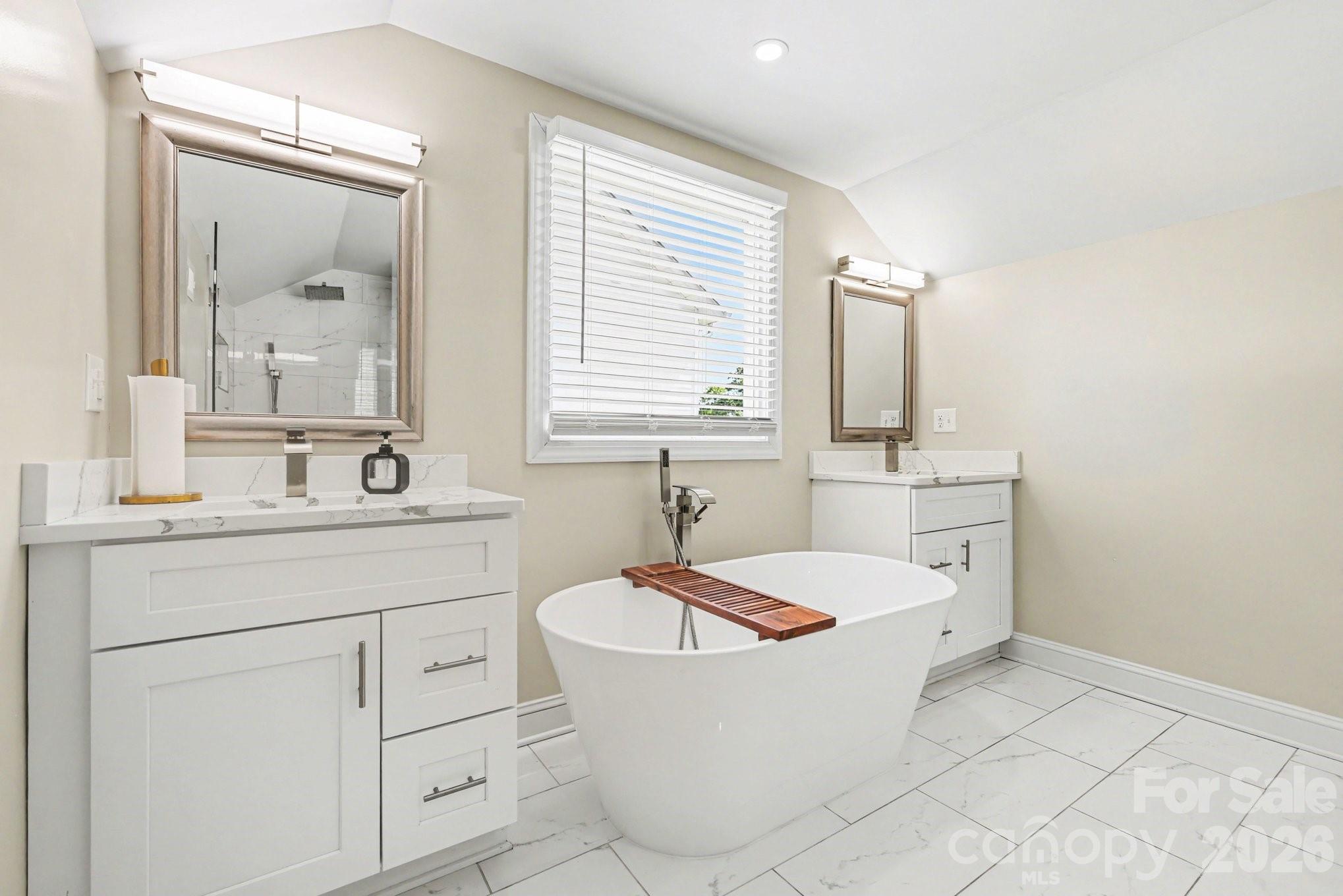 Discover this beautifully updated and modernized 4-bedroom, 3-full-bath home in a prime Charlotte location. The refreshed interior offers contemporary finishes and an inviting open layout perfect for modern living. Upstairs awaits a luxurious primary retreat with soaking tub and expansive shower. Step outside to the fully fenced yard and nice back deck, ideal for entertaining and relaxation. This home is perfect for everyone, or a great investment property to rent out or use as an Airbnb. Move-in ready.
