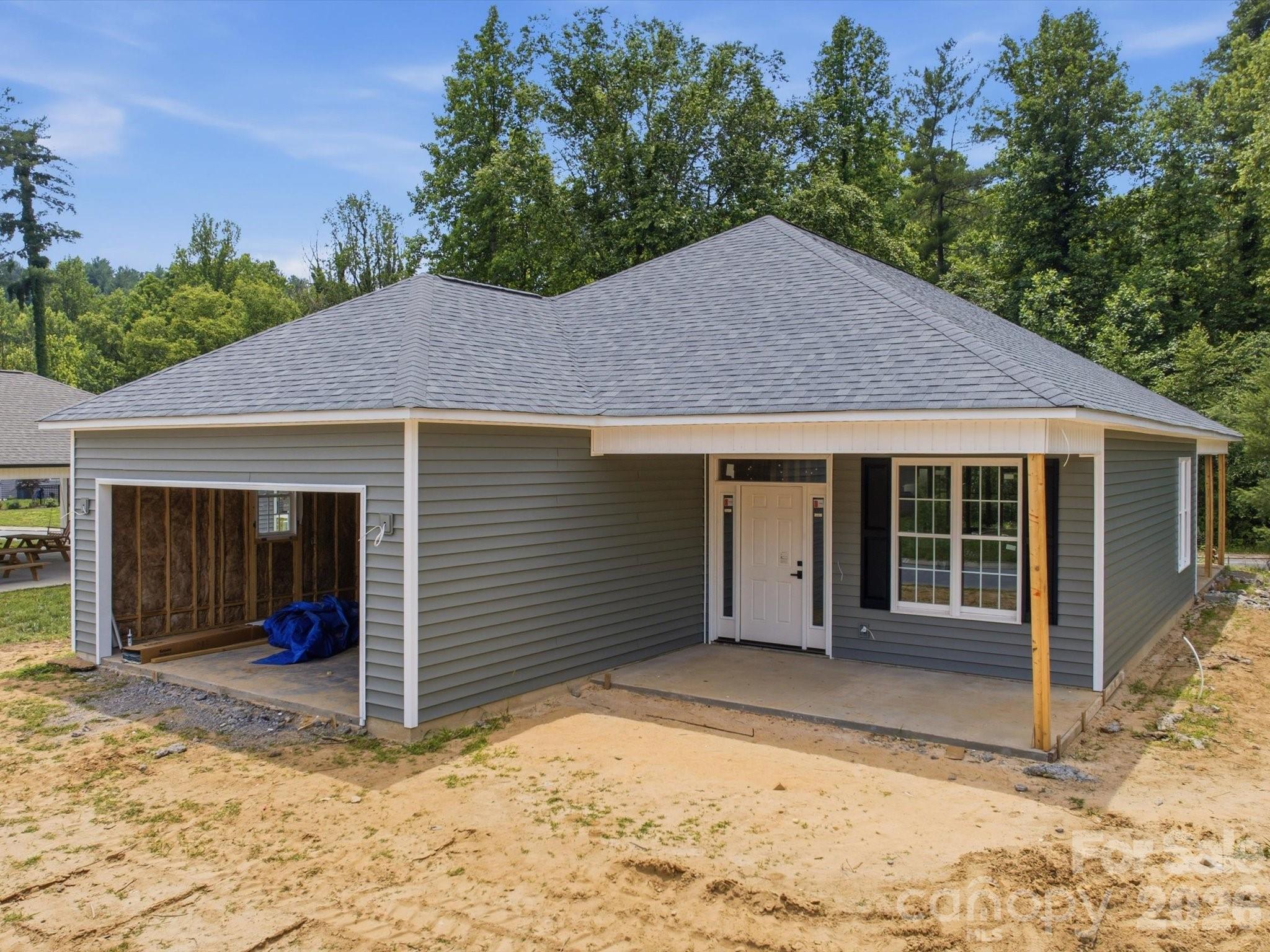 NEW CONSTRUCTION- Proposed Completion July 2026. This gorgeous three-bedroom, two-bathroom home is situated in Eagles Landing subdivision, nestled in the Glen Alpine area near the Catawba River, and offers one-level living at its finest. Inside, a large living room flows seamlessly into a modern kitchen featuring stainless steel appliances, quartz countertops, and durable vinyl plank flooring throughout. The spacious primary suite includes a private bathroom and walk-in closet, while two additional bedrooms and a second bathroom provide comfort and flexibility for guests, a home office, or a growing family. A thoughtfully designed layout, contemporary finishes, and easy access to nature and local amenities make this property an ideal retreat for those seeking convenience, style, and a tranquil lifestyle.