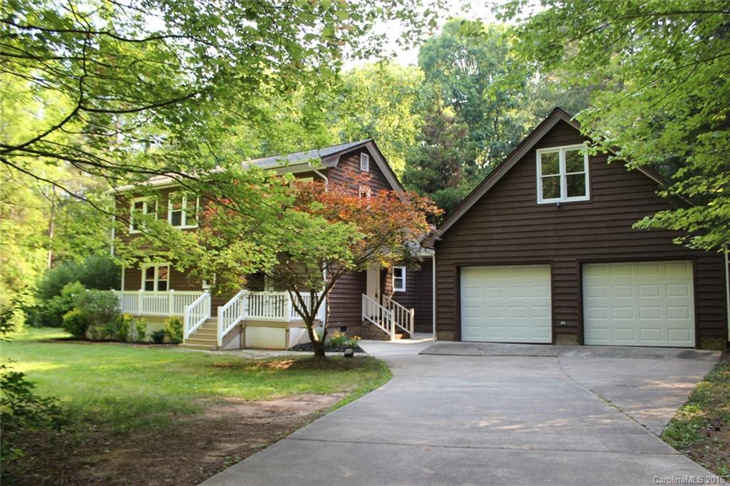 Completely remodeled home on a very private 4.4 acre lot!  This home has a brand new roof, HVAC units, windows, kitchen cabinets, flooring, fixtures and more!  With 3 bedrooms, 2 baths, and a detached 2 car garage with finished space above it, this home will be sold FAST!  If you want privacy, this home is perfect.  Come see it today!