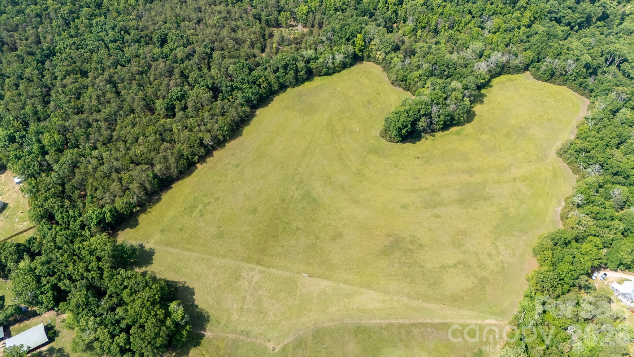 Bring your dream estate to life on this spectacular acreage in York. Sprawling across over 26 pristine acres on Oregon Trail Road, this property offers the ultimate canvas for private, upscale living. Imagine designing your custom home surrounded by mature trees, creating a peaceful family compound, or establishing a beautiful equestrian estate. Here, you have the rare freedom to build exactly what you want, complete with expansive outdoor entertainment areas, walking trails, or a private workshop. While it feels like a secluded sanctuary where you can truly breathe, you are still within easy reach of local conveniences, dining, and schools. This is more than just a piece of land; it is the foundation for the lifestyle you have been waiting to create.