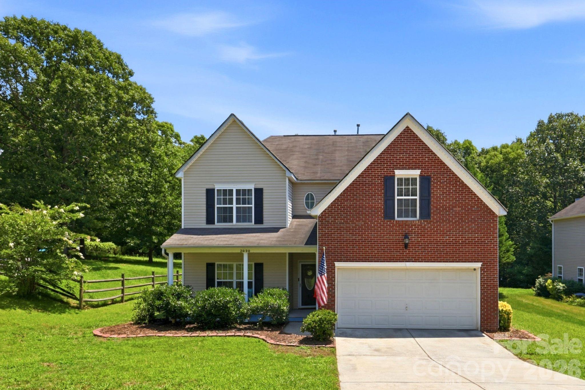Walkable to the heart of downtown Waxhaw, only 1 1/2 miles along sidewalks all the way! Desirable Cuthbertson High School assignment adds to the allure of this beautifully updated home, including lots of custom features! The main level boasts a primary suite with soaring ceilings and updated bath. A huge dual sided walk-in closet is off the primary suite. A main level, large office is located overlooking the rocking chair front porch. A handy powder room is off the entry hallway and has also been kissed by some custom updates. The formal dining room opens into a custom, bespoke beverage center for your morning coffee or your cocktail hour. It is equipped with a beverage fridge and custom shelving with lovely backsplash, reflecting gorgeous light and quartz counters. From this area step into a fully updated kitchen with new designer inspired cabinets, quartz counters, high end appliances and refreshed lighting. A large breakfast peninsula has been added for bar stools to entertain. The breakfast room features a bay wall for lots of natural light and ample seating spaces. Next, you reach the center of this home, featuring a two-story great room with fireplace and an upper loft overlooking the soaring height, crowned with a stunning new light fixture. The upper level boasts five more bedrooms with a loft/bonus room in the center of all the rooms. Two rooms share a Jack and Jill bath, and a common bath is shared by three other bedrooms. Four of the five upper bedrooms are crowned with soaring ceilings that add to the spacious feeling of each. There is ample storage throughout the home, including one bedroom with two closets and access to attic storage. The bonus room overlooks the two-story great room but sound dampening windows could be added to the spaces to allow the natural light to still pour into this space but give one sound isolation. The rear of the home has a newly added deck and a grilling patio off the rear deck for lots of space for your grill master ambitions. The rear garden has a vegetable patch that is flourishing. There is a rear shed for storing your garden equipment. The yard is bordered by many mature trees, but the expansive yard would be ideal for a pool or a playground!
