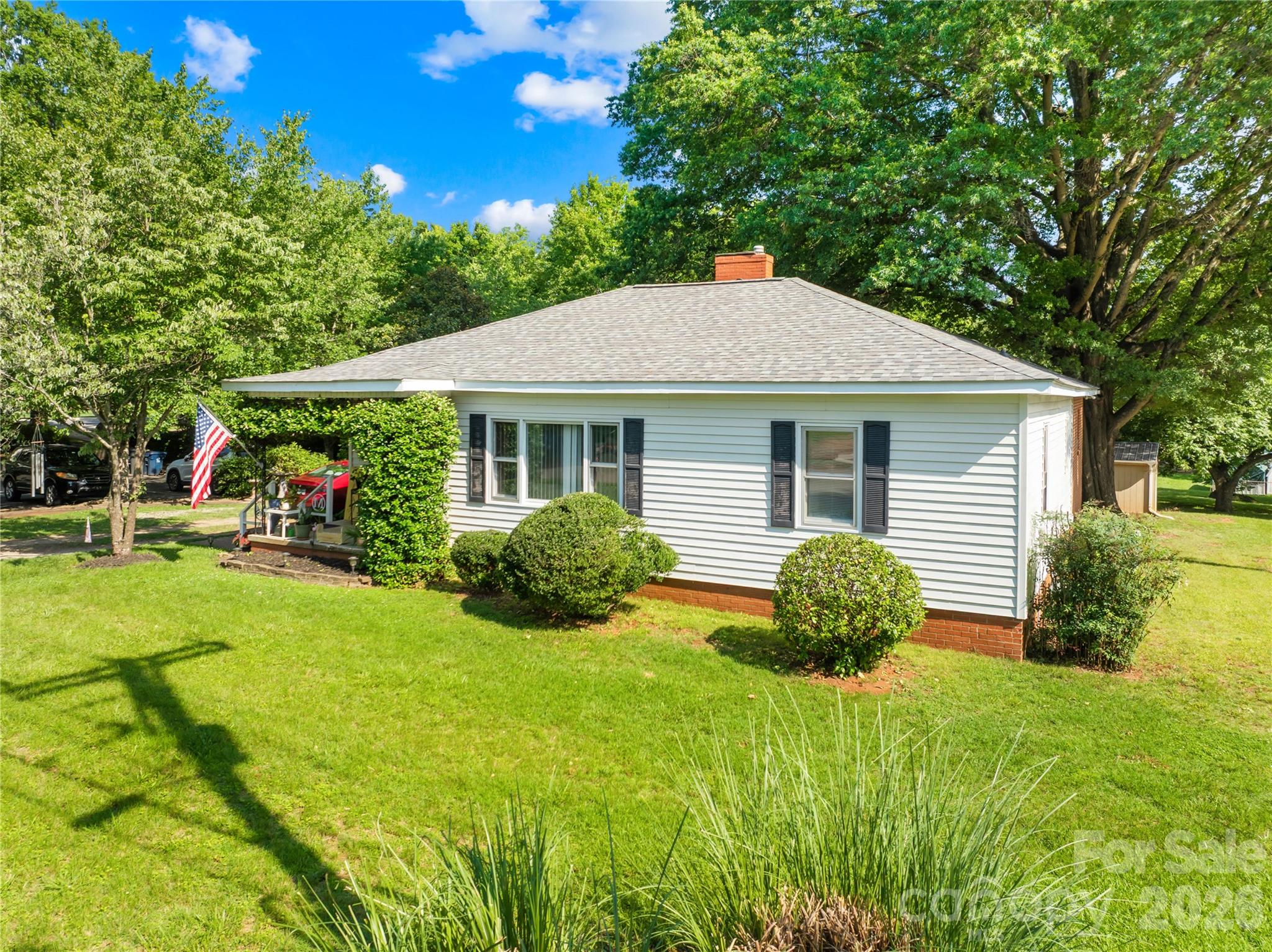 Rare opportunity to own a home in the heart of Huntersville's highly desirable Town Center district. The property features a large backyard with s detached garage ideal for storage, hobbies, or a workshop.

Excellent walkable lifestyle with restaurants, shopping, coffee shops, parks, and everyday necessities just a short stroll away in Huntersville Town Center. Located only minutes from I-77, providing quick access to Charlotte, Lake Norman, and surrounding areas.

The property's TC (Town Center) zoning offers unique flexibility and long-term value, allowing for residential, office, or commercial uses subject to town regulations. Whether you're looking for a primary residence, investment property, or future live-work opportunity, this property provides endless potential in one of Huntersville's fastest-growing and most sought-after locations.