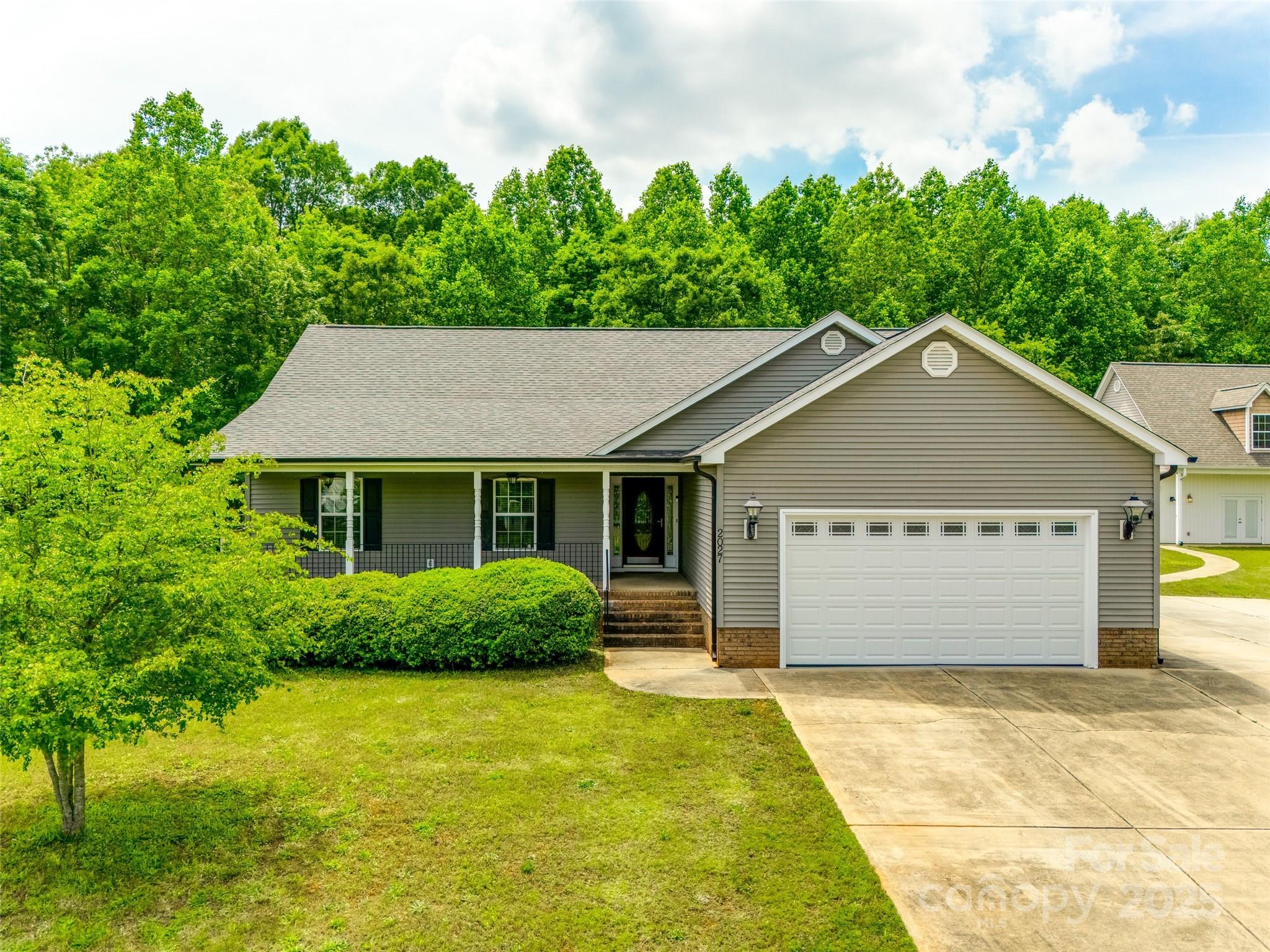Welcome to this 3BR/2BA home with a 2-car garage and an impressive detached shop on 2 acres with no HOA and no city taxes, just a mile off the interstate. The kitchen features custom cabinets, silestone countertops, black stainless appliances, vaulted ceilings, and a farmhouse sink. Enjoy gas fireplaces in the living room, primary suite, and sunroom. The primary bedroom includes a sunroom that can be used as an office, sitting area, or flex space. Additional highlights include a new roof (2024), extra parking, a fenced backyard perfect for pets or play, and a storage shed for tools and equipment. The oversized detached shop has power and offers endless possibilities—use it as a workshop, studio, extra storage, or finish it out for a second living quarters or guest space. This property is conveniently located near shopping, dining, parks, golf courses, and the interstate for easy commuting. Come see the options and potential this unique home has to offer!