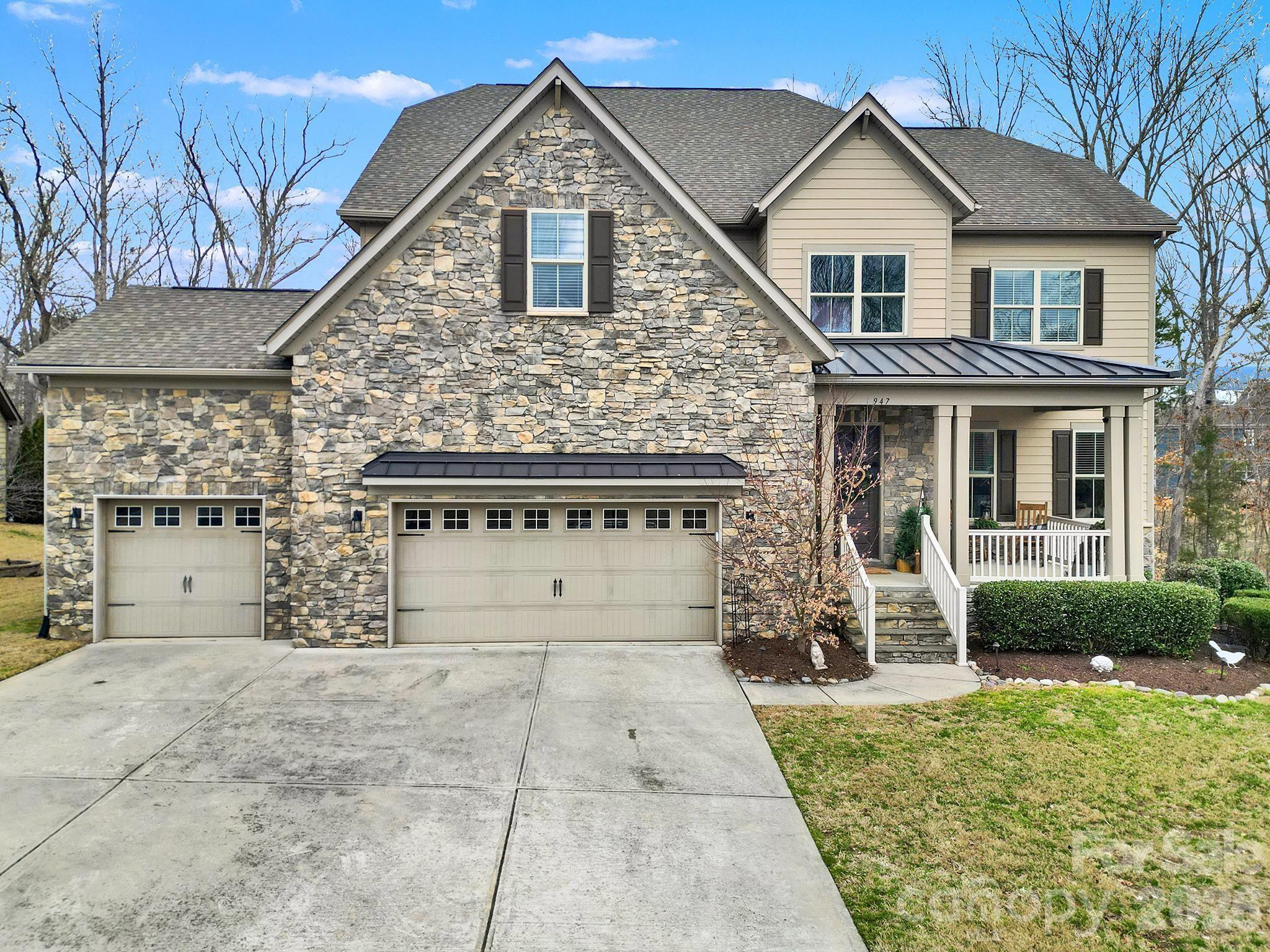 Welcome to this stunning and thoughtfully designed 5-bedroom, 4.5-bath home located in the highly desirable Retreat at Rayfield community. Offering exceptional space, versatility, and luxury finishes throughout, this home is perfect for entertaining and multigenerational living. Main level features a private guest suite with its own living room—ideal for multigenerational living. Gourmet kitchen offers 2 large custom walk-in pantries, wine bar/butler’s pantry, oversized island with seating for 8, and large dining area open to the living room—perfect for entertaining. Front flex space with wet bar makes a great office or sitting room. Upstairs features a luxurious primary suite with spa-like shower and dual walk-in closets, plus 3 additional bedrooms, 2 full baths, loft, and dedicated office. Enjoy a 2-tier partially covered deck and custom paver patio overlooking a wooded backyard. Large private lot with protected green space on one side. Community amenities include pool, clubhouse, fitness center, playground & trails.